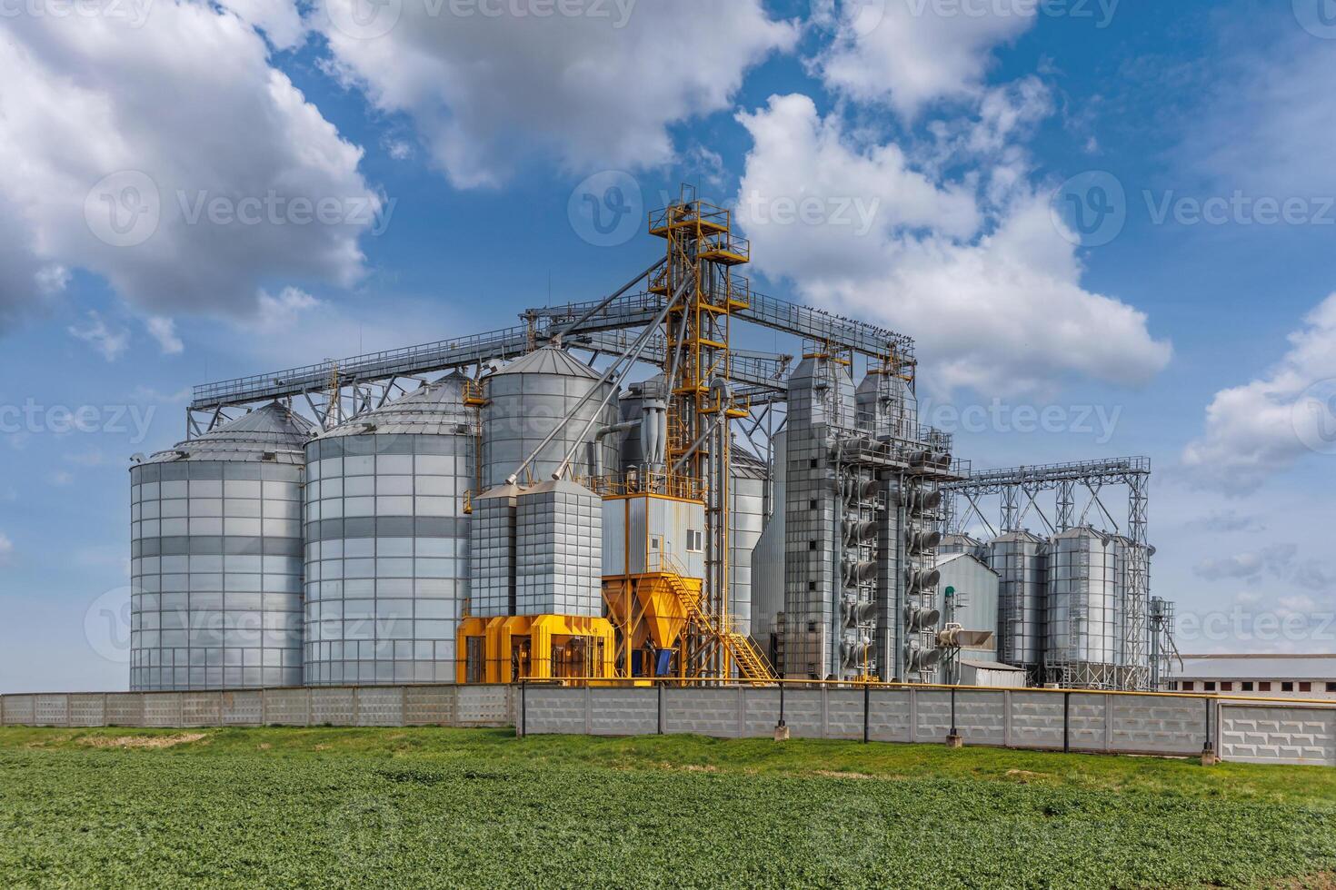 silos granary elevator on agro-industrial complex with seed cleaning and drying line for grain storage photo
