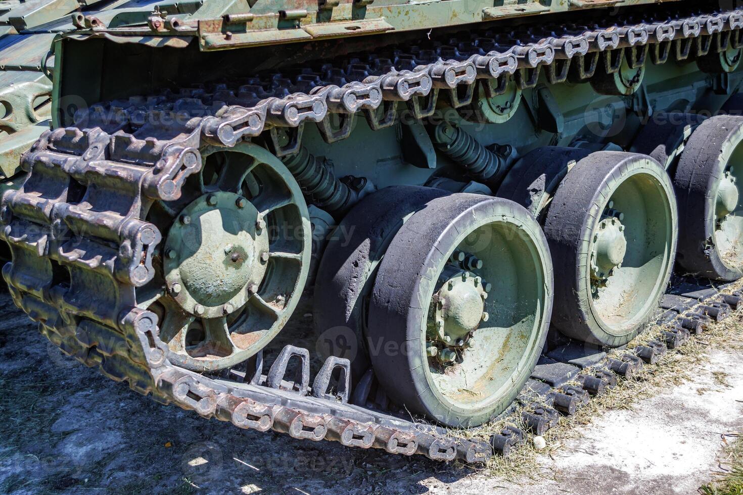 tank t80, armored vehicles with dynamic protection unit on street in green khaki color photo