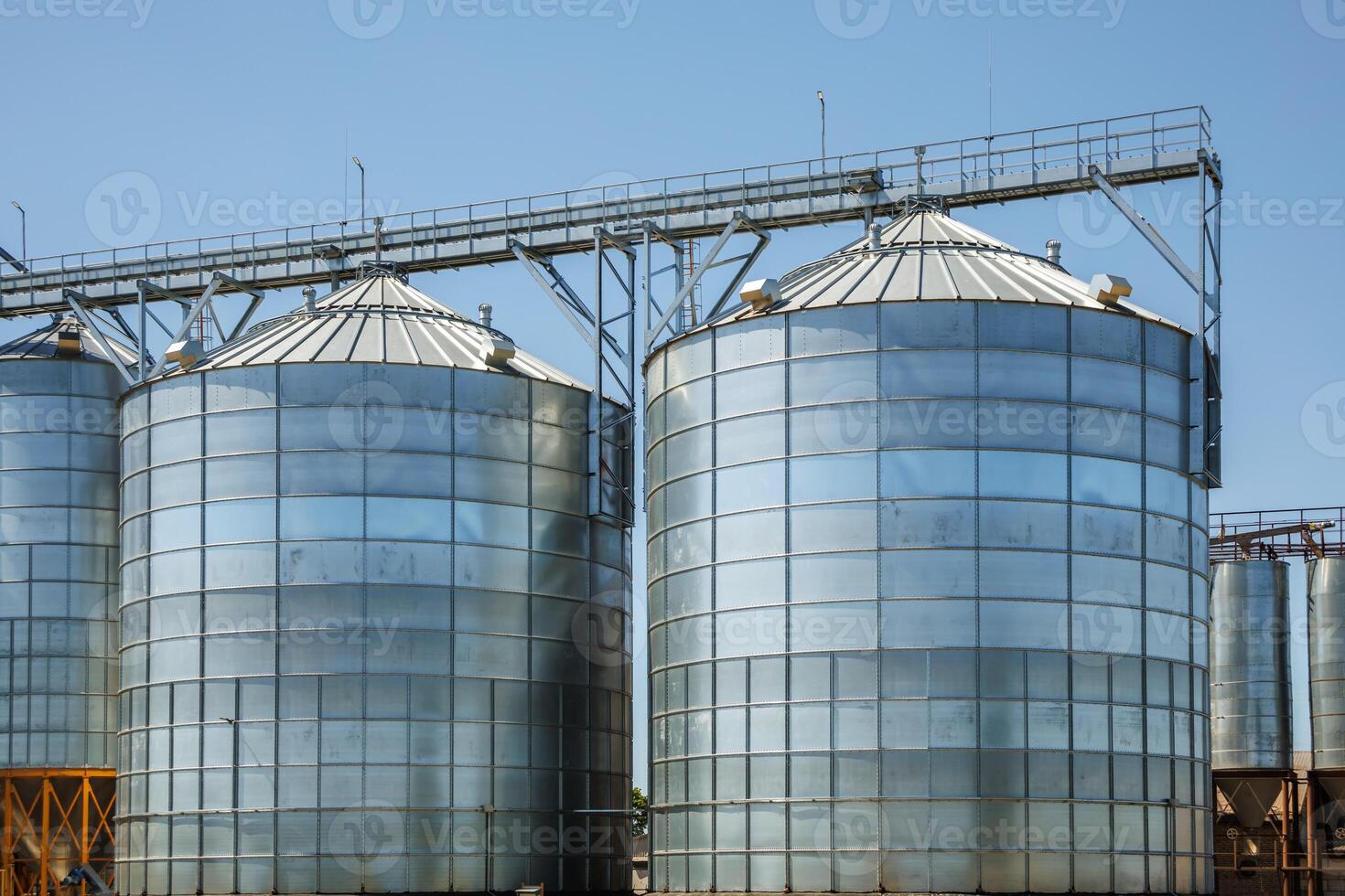 silos granary elevator on agro-industrial complex with seed cleaning and drying line for grain storage photo