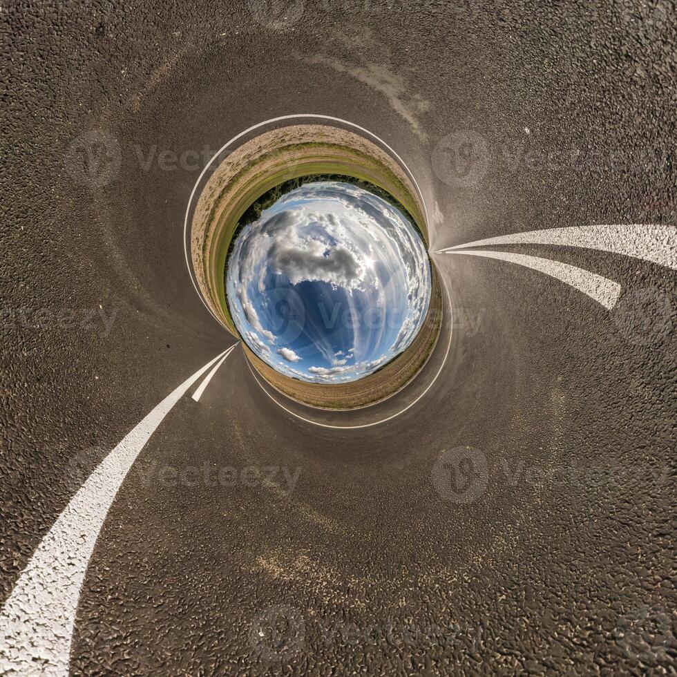 blue hole sphere little planet inside sand or dry grass round frame background photo