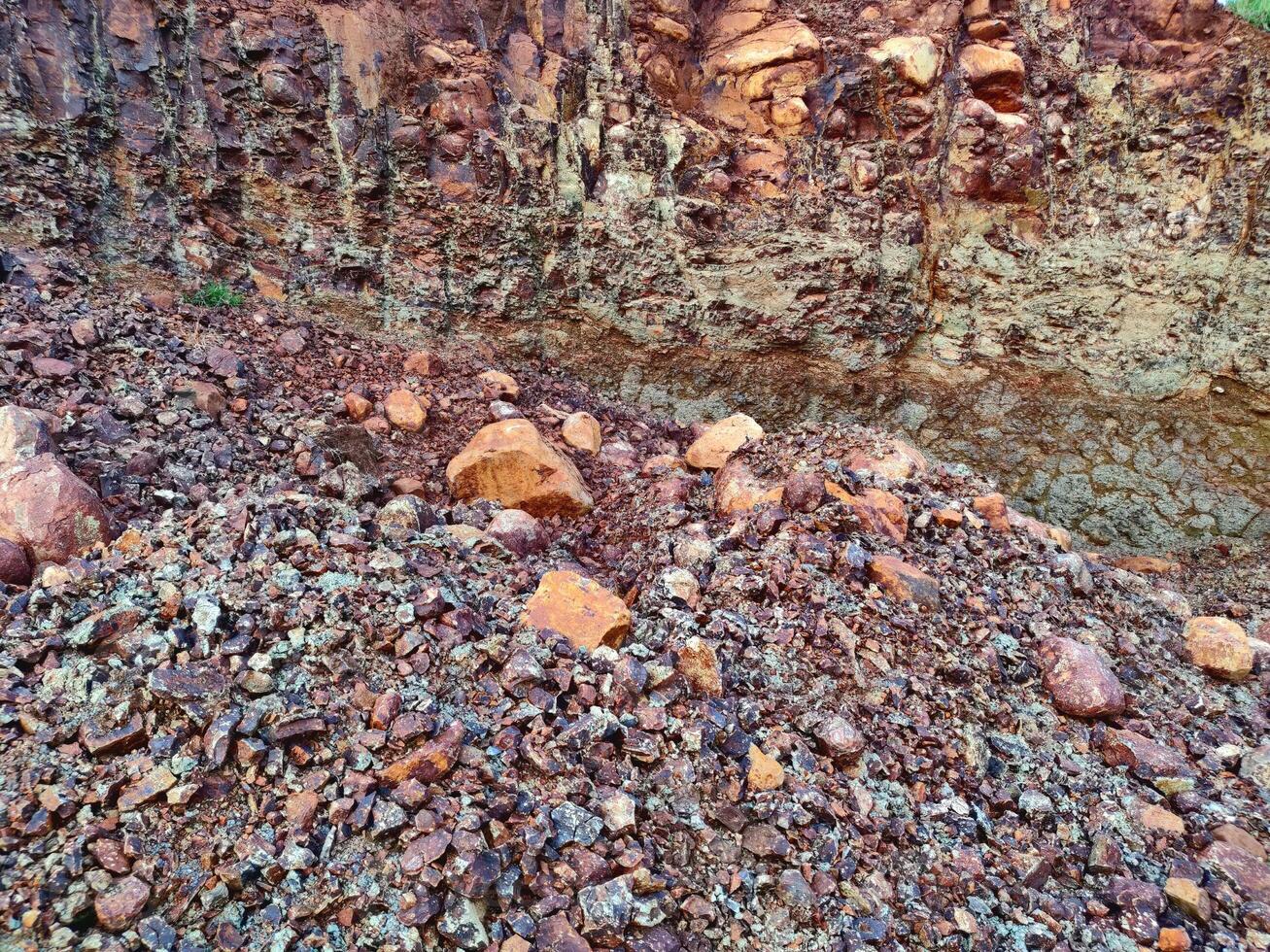 Mining site hill cut down to extract minerals from the Earth photo