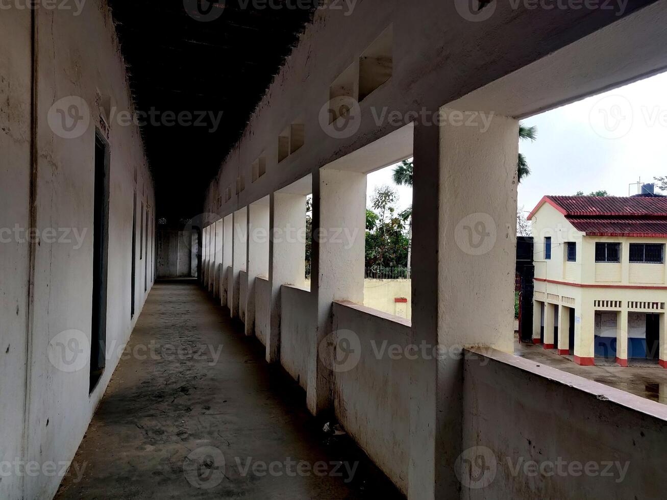 Empty Walkway in an old school corridor in an Indian village Bihar photo