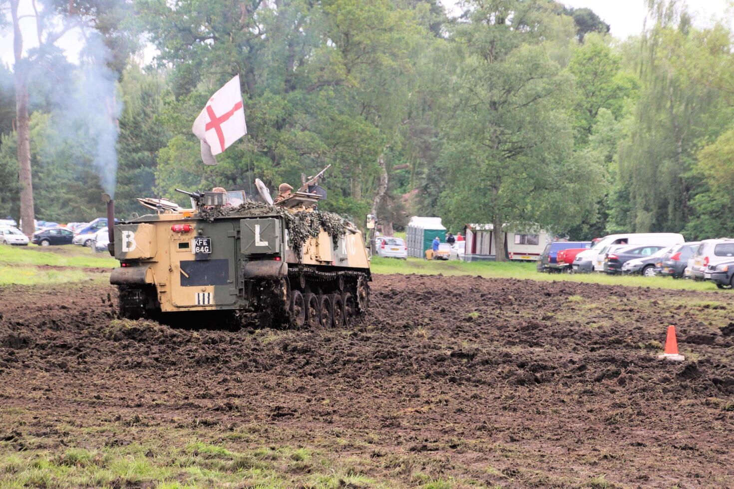 Malpas in Cheshire in the UK in September 2020. A view of a Landrover going through the mud in a field photo