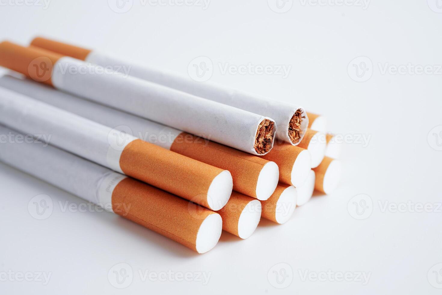 Cigarette, roll tobacco in paper with filter tube, No smoking concept. photo