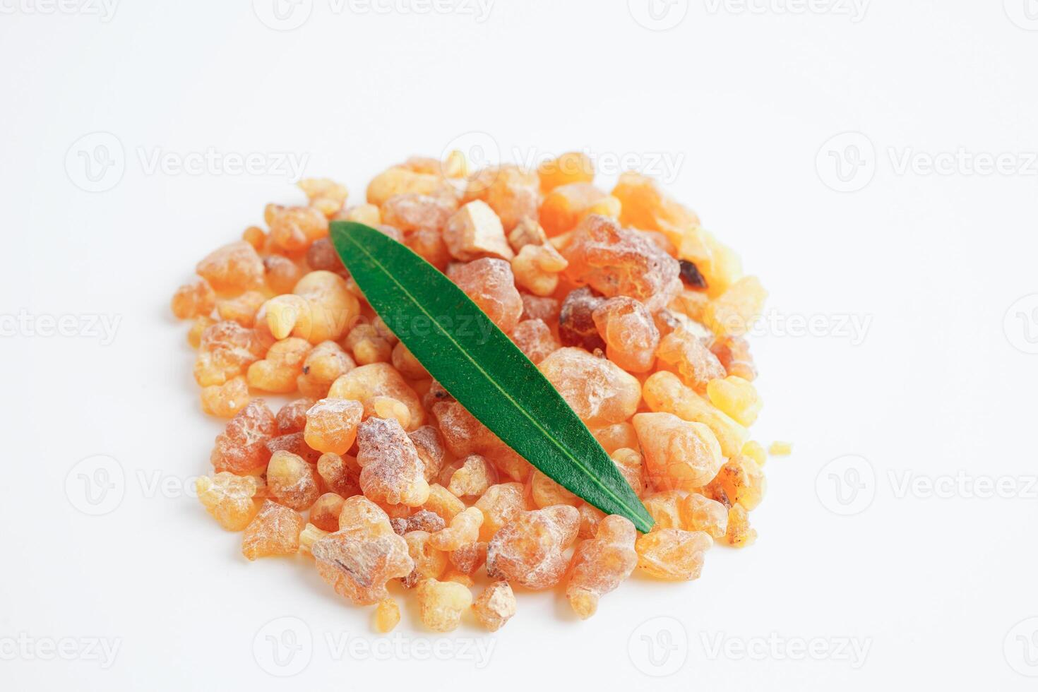 Frankincense or olibanum aromatic resin isolated on white background used in incense and perfumes. photo