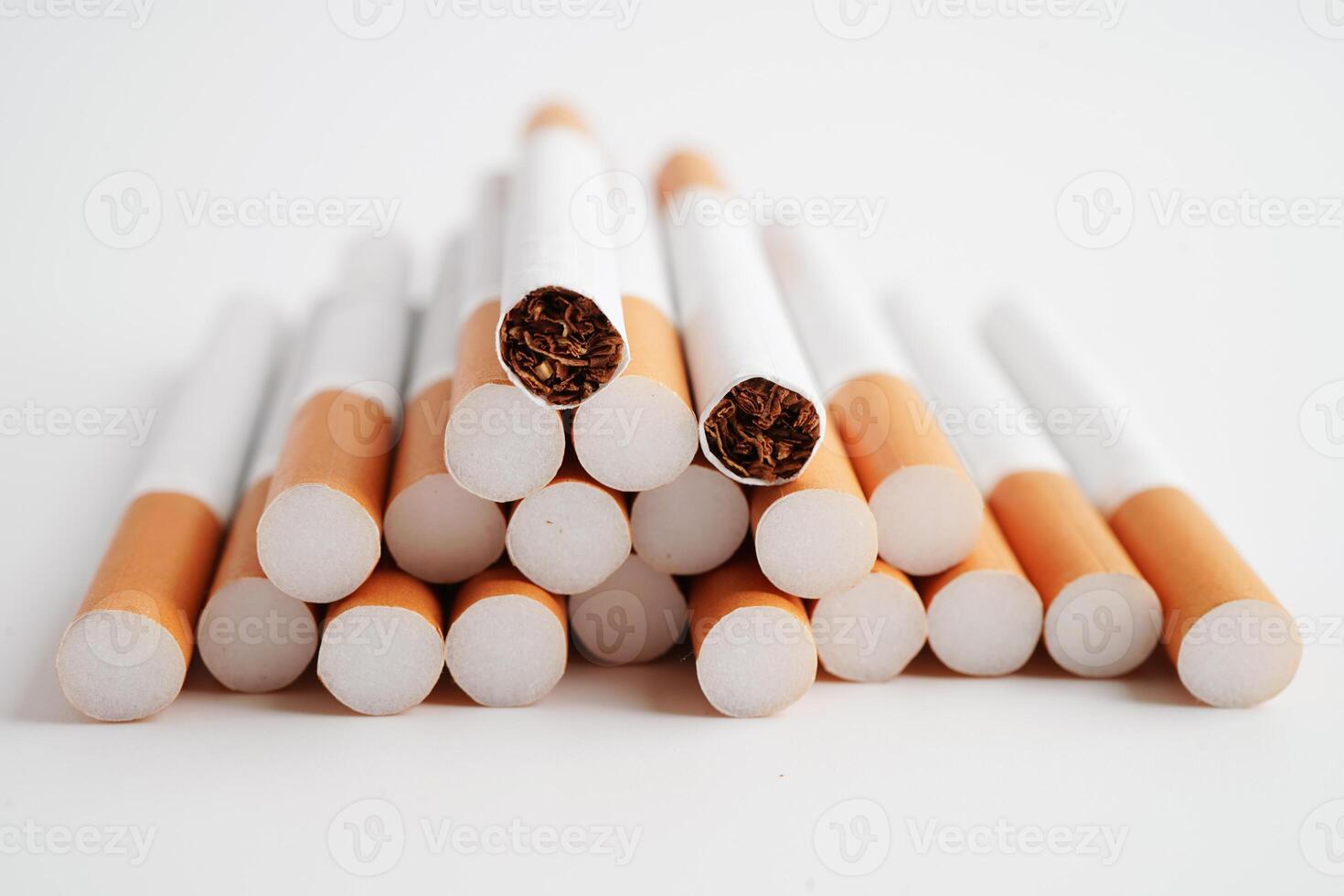 Cigarette, roll tobacco in paper with filter tube, No smoking concept. photo