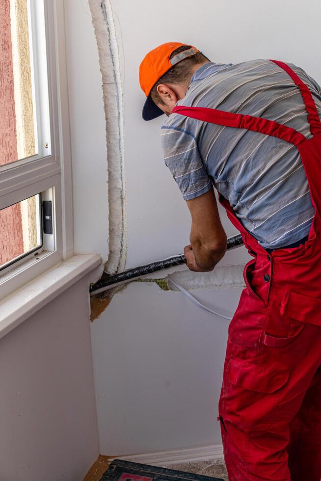 Installing an air conditioner in an apartment office Lviv Ukraine 08.04.2024 photo