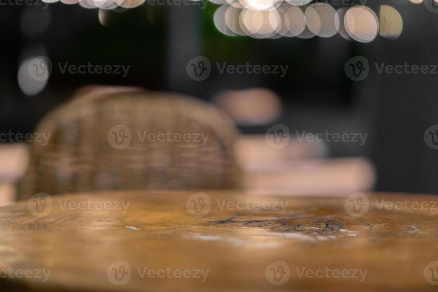 Emptty wooden table with blurred background of cafe for mockup product photo
