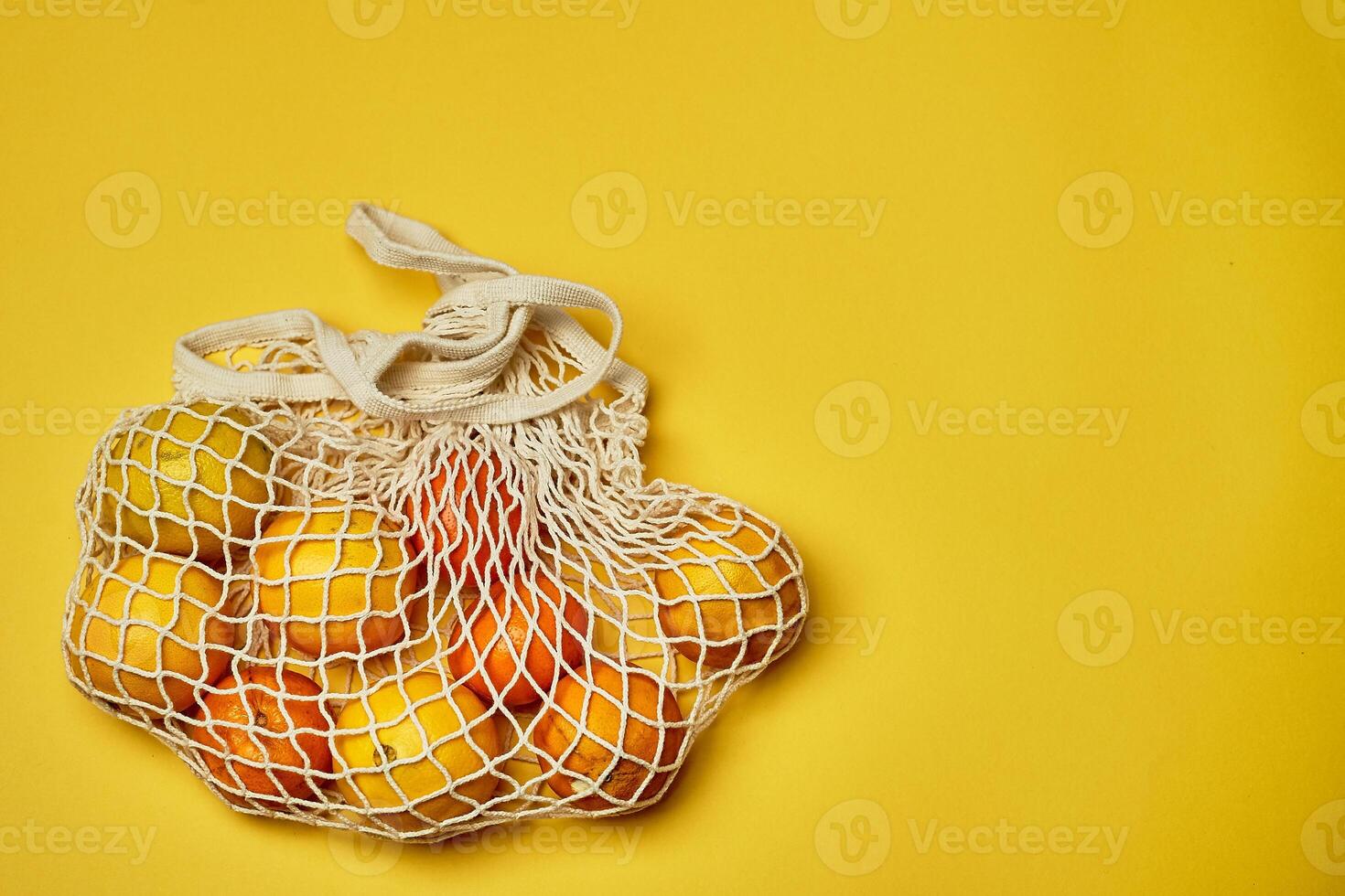 Replacing plastic bags. Taking care of the environment. Grid with fruit on colored paper, fortification. Minimalism. photo