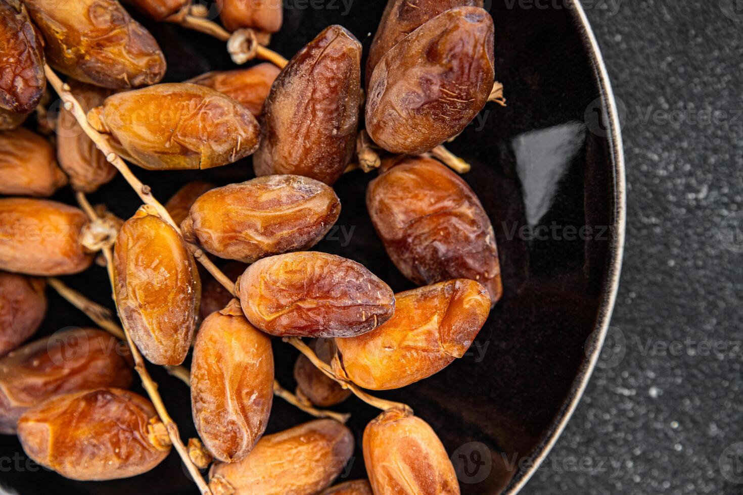 date branch dried fruit fresh appetizer food snack on the table copy space food background rustic photo