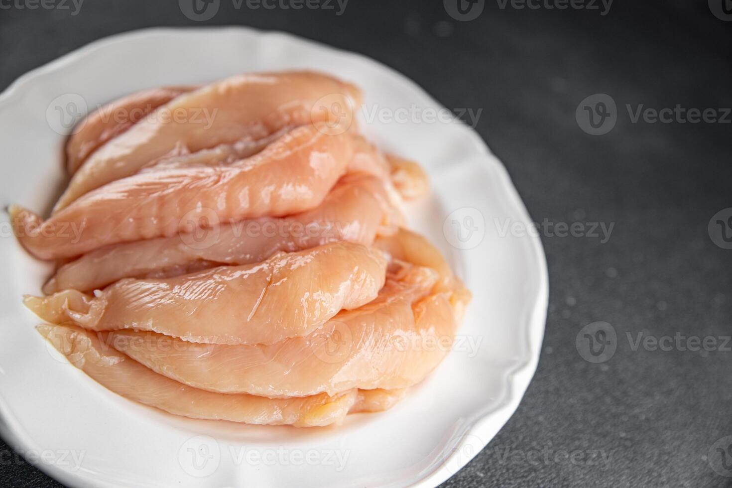 raw chicken meat aiguillettes fresh cooking meal food snack on the table copy space food background rustic top view photo
