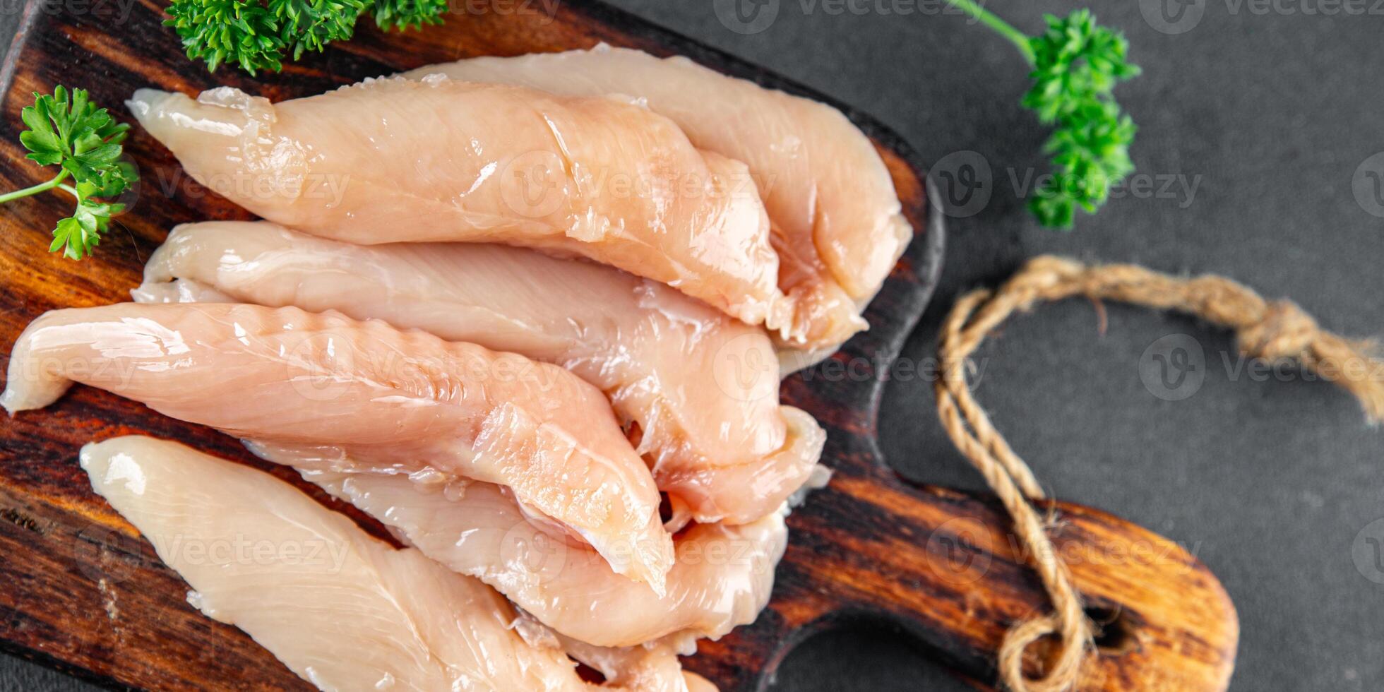 chicken meat raw aiguillettes fresh cooking meal food snack on the table copy space food background rustic photo