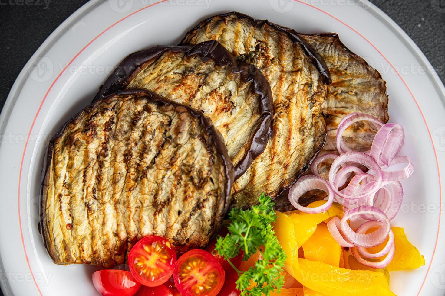 grilled vegetables eggplant, pepper, tomato fresh cooking appetizer meal food snack on the table copy space food background rustic top view photo