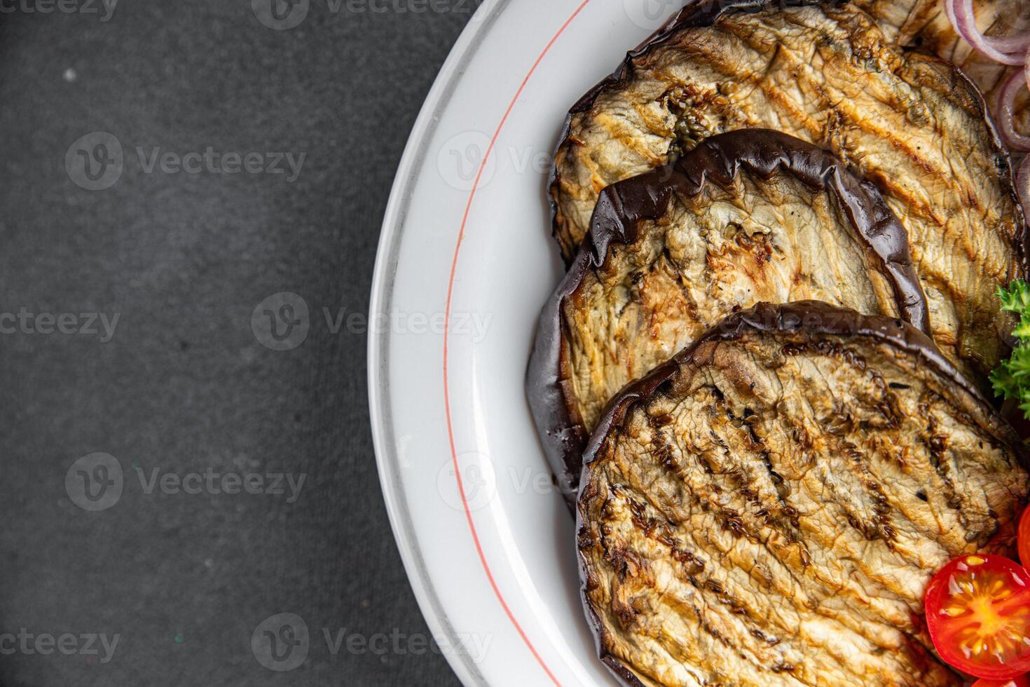grilled vegetables eggplant, pepper, tomato fresh cooking appetizer meal food snack on the table copy space food background rustic top view photo