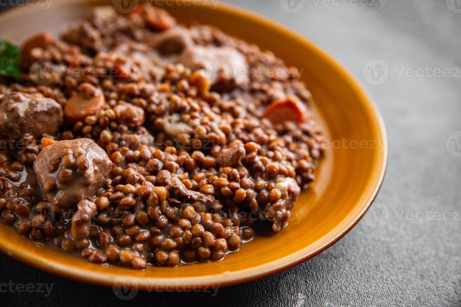 lentils with meat beef or pork fresh cooking appetizer meal food snack on the table copy space food background rustic photo