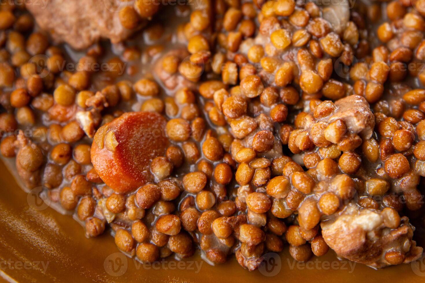 lentils with meat beef or pork fresh cooking appetizer meal food snack on the table copy space food background rustic photo