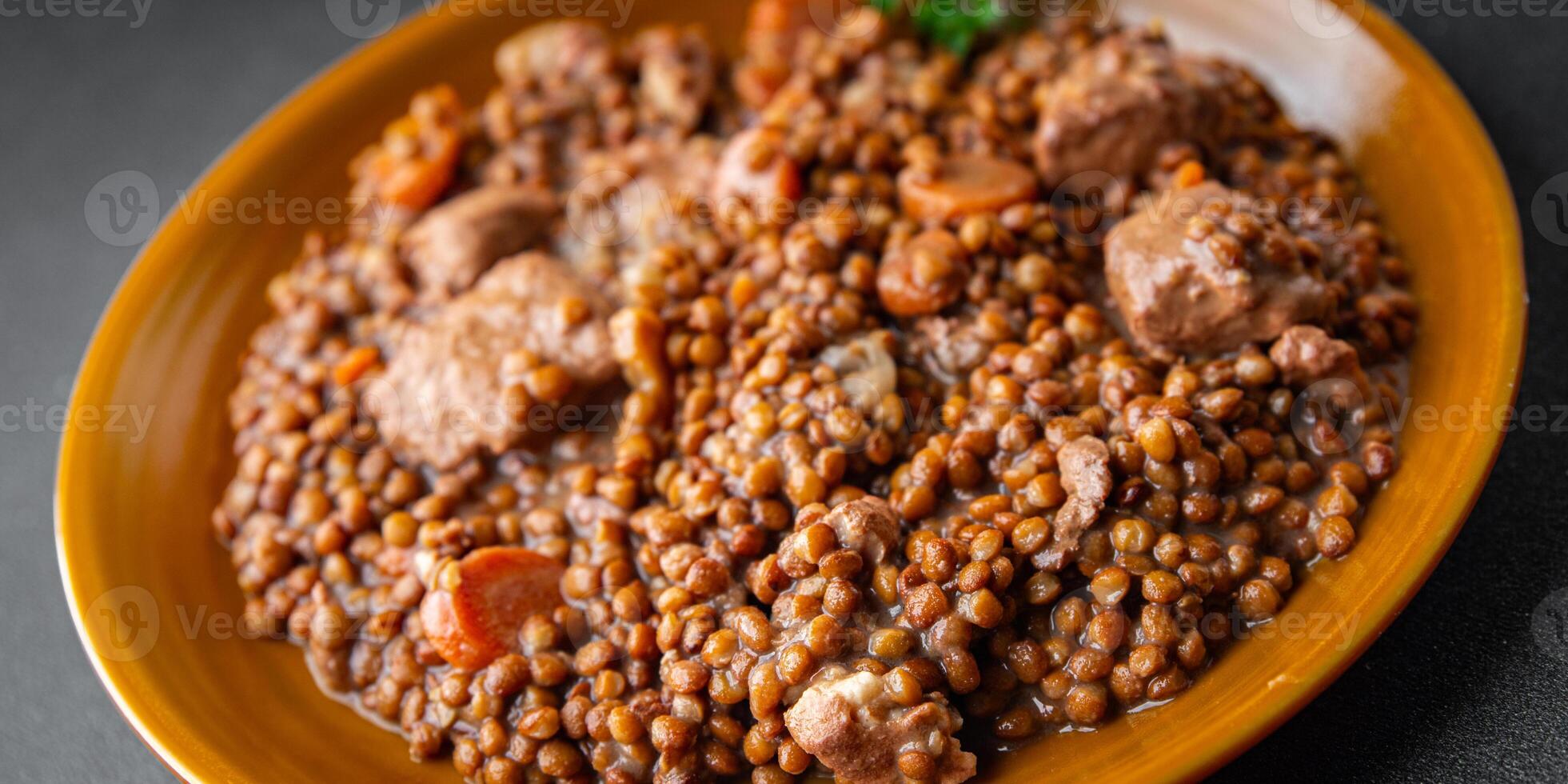 lentils with meat beef or pork fresh cooking appetizer meal food snack on the table copy space food background rustic photo
