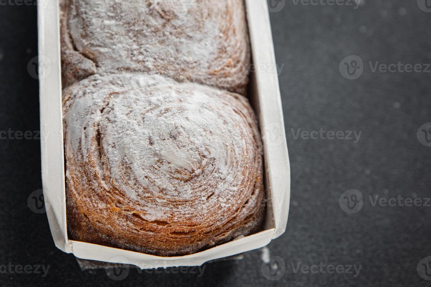 bun brioche sweet puff pastry dessert fresh cooking meal food snack on the table copy space food background rustic top view photo