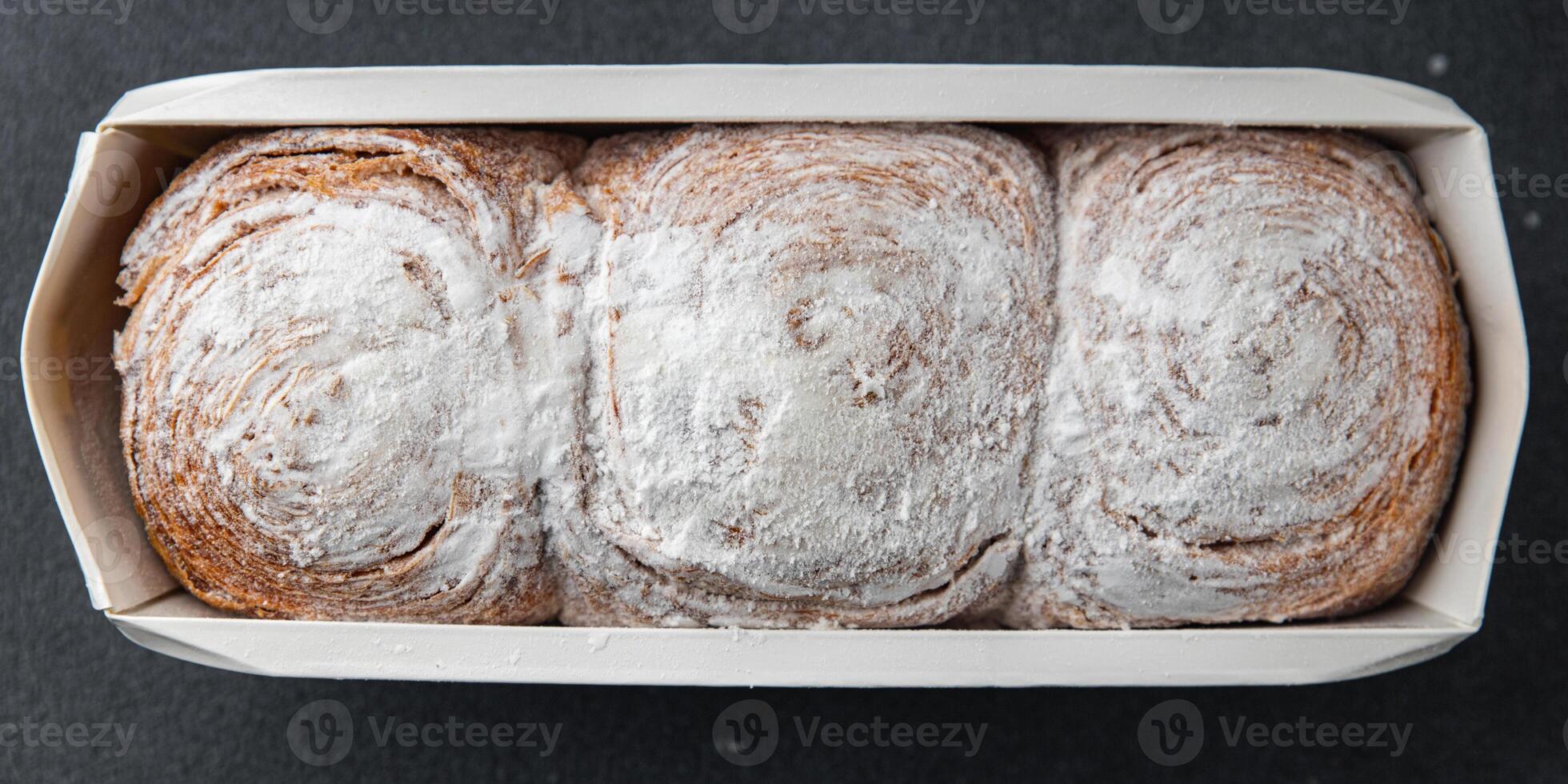 bun brioche sweet puff pastry dessert fresh cooking meal food snack on the table copy space food background rustic top view photo