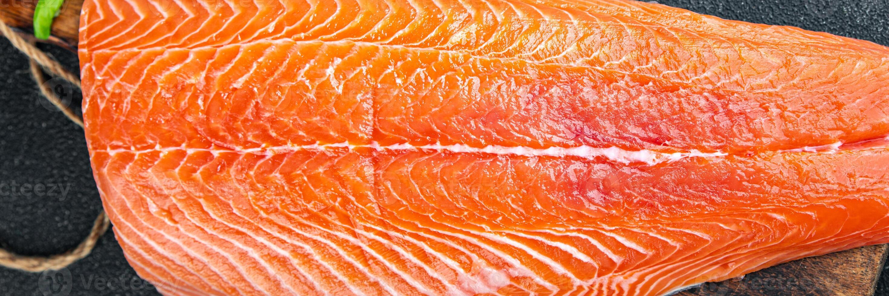 salmon fillet raw red fish seafood appetizer meal food snack on the table copy space food background rustic top view vegetarian food no met Pescetarian photo