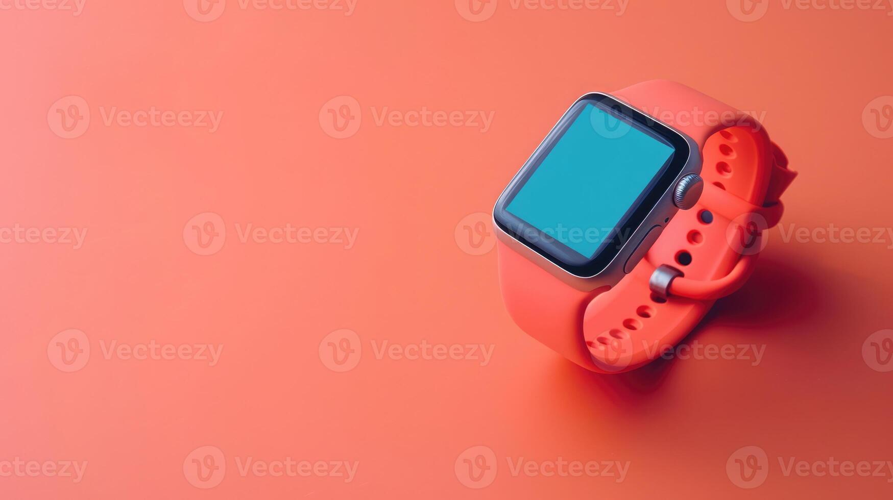 Artistic fitness tracker on a soft coral background with abundant copyspace photo