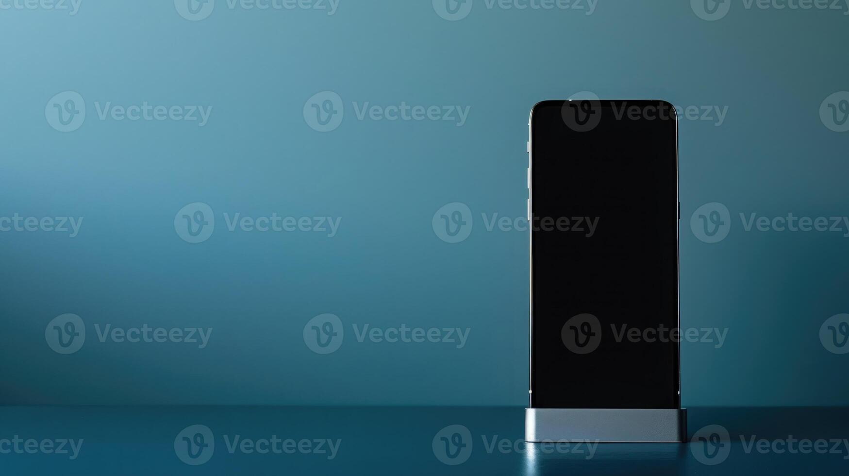 Minimalist smartphone stand on a powder blue background with ample copyspace for creative projects photo