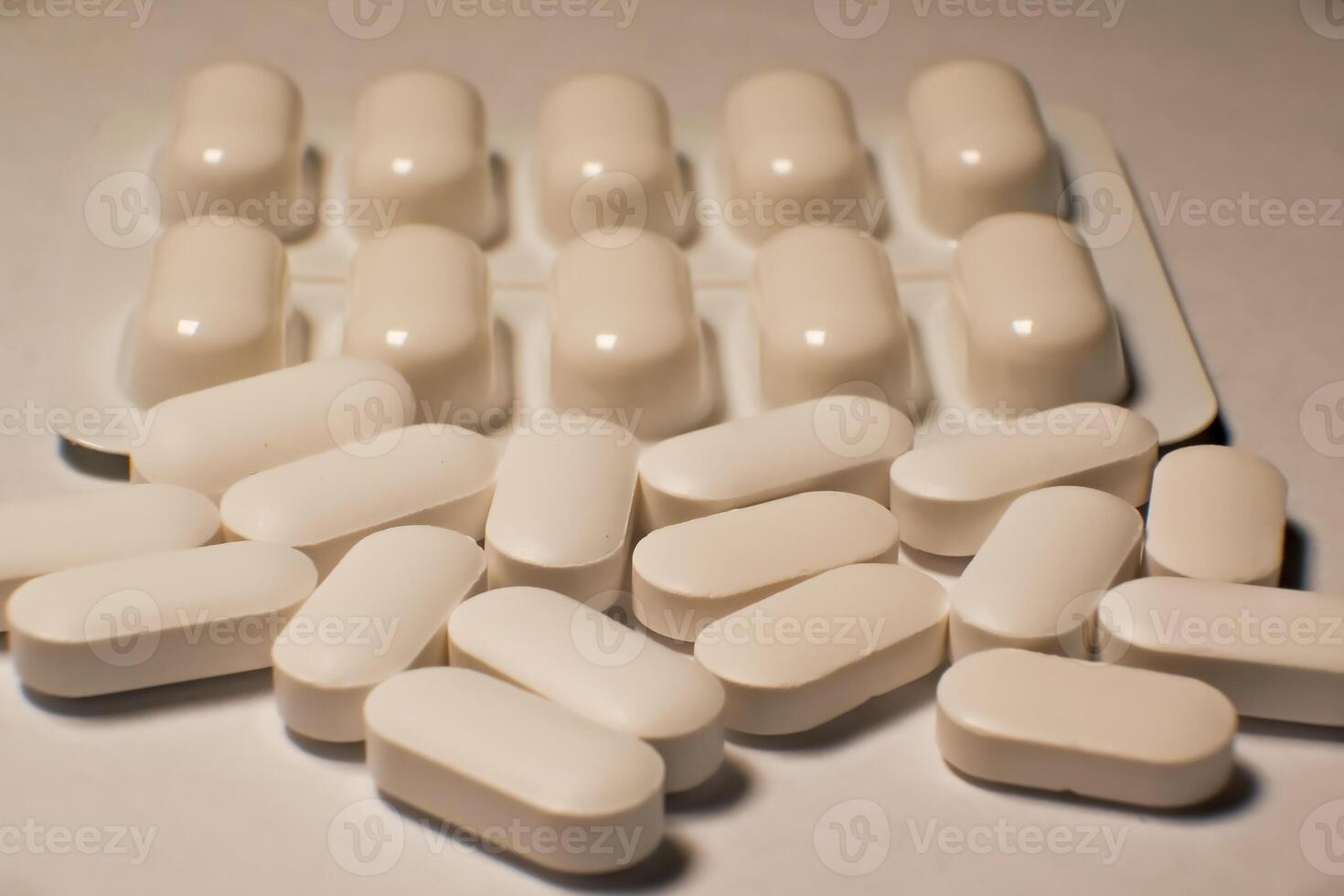 tablets . white tablets. close-up . the concept of health, treatment. photo