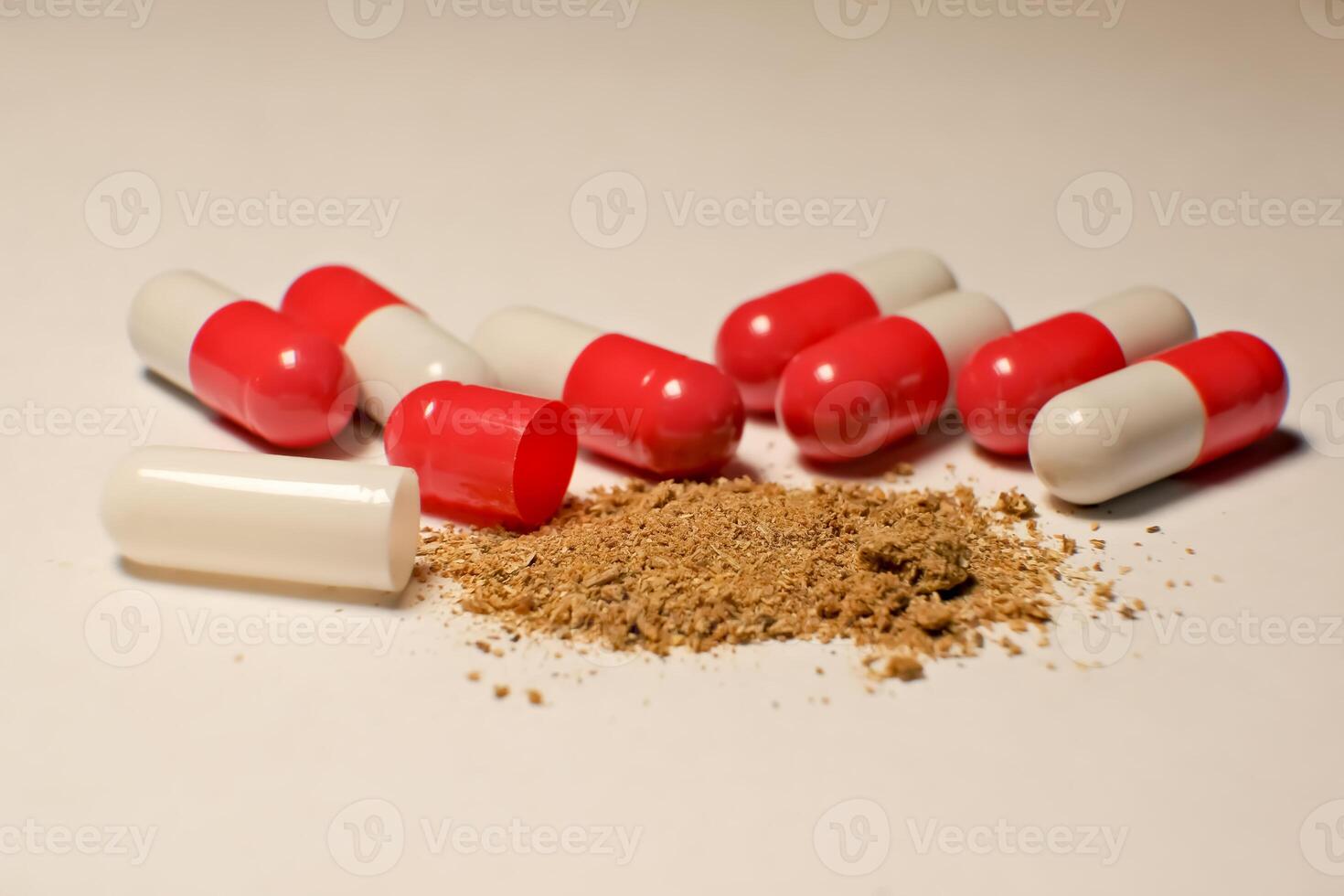 open tablet.tablet contents. white and red tablets. close-up . the concept of health, treatment. photo
