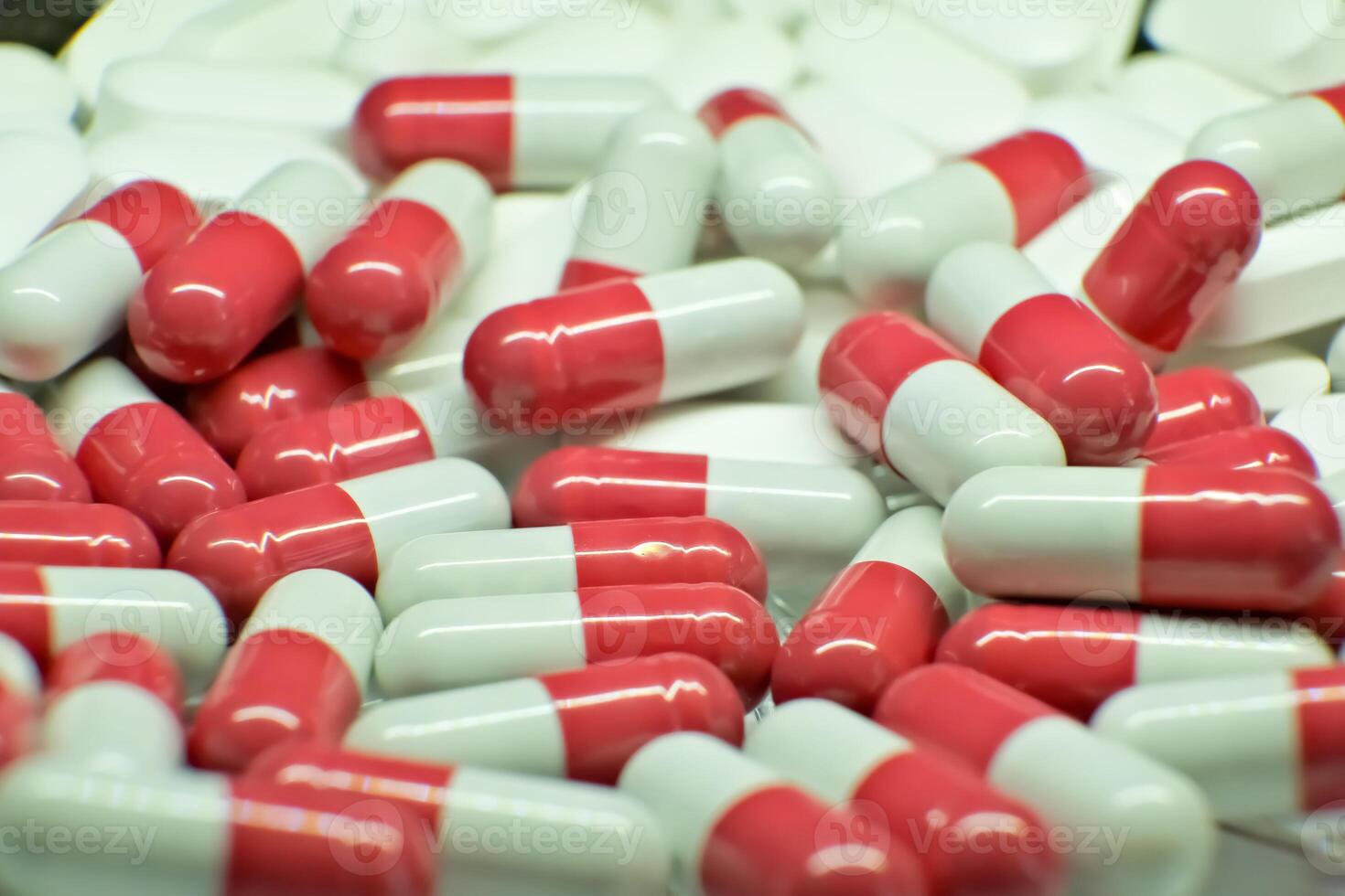 tablets . white-red tablets. close-up . the concept of health, treatment. photo