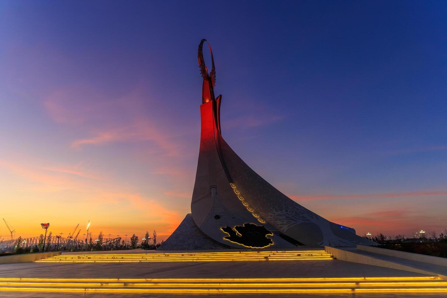 Tashkent, Uzbekistan - April 19, 2023 Memorial of Freedom and Independence in the form of a pyramid with a structure of national color on the square of the city park New Uzbekistan- Yangi Uzbekistan photo