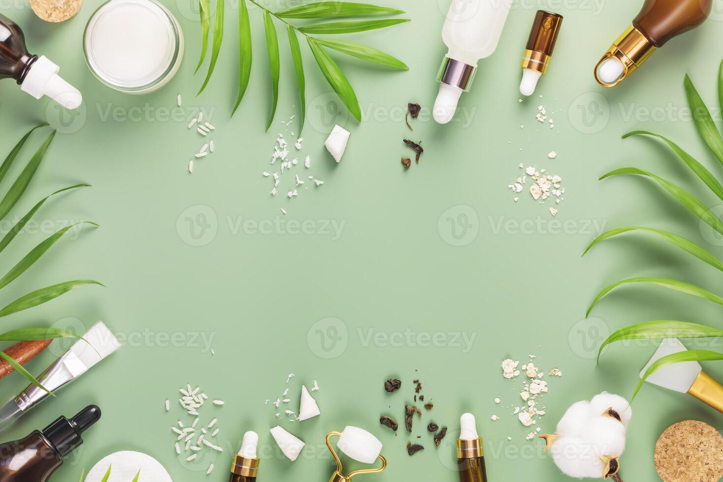 Frame of rice and green tea serum, oatmeal cream and coconut water photo