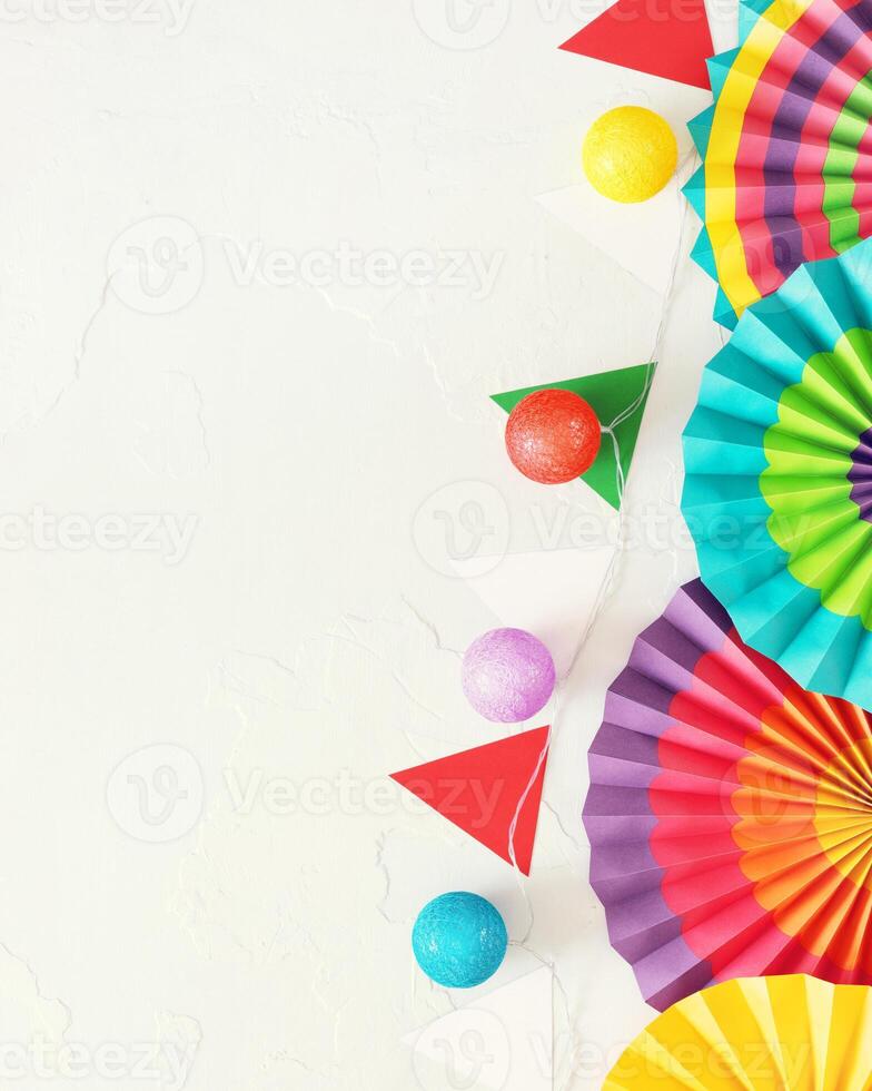 paper fans, garlands in the colors of Mexico on a white background photo