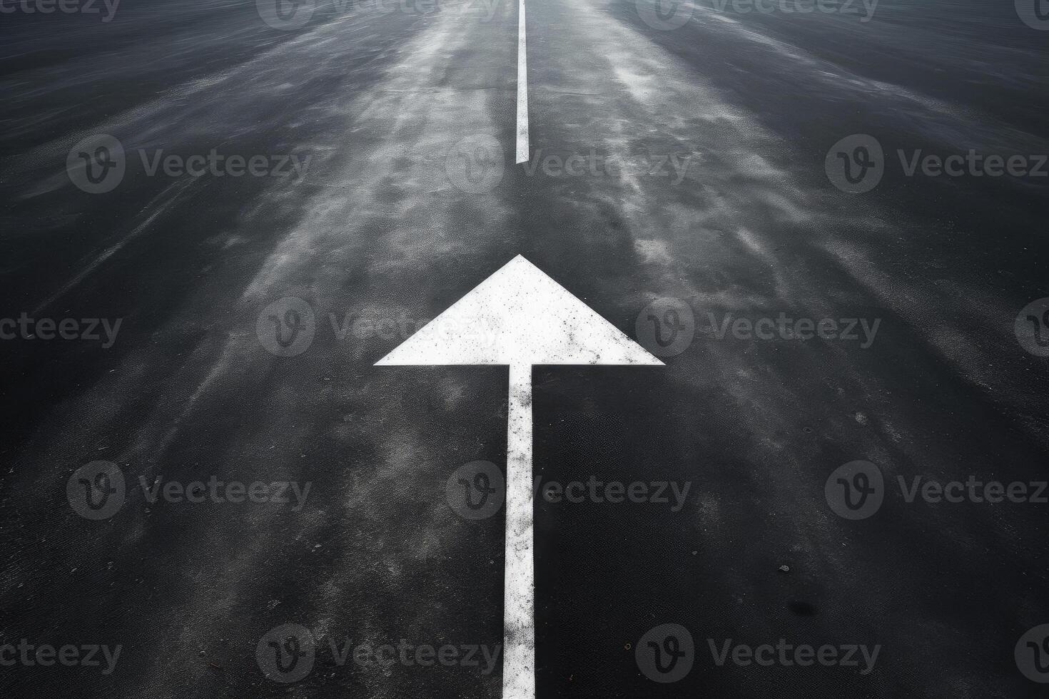 Arrow on Asphalt Road photo