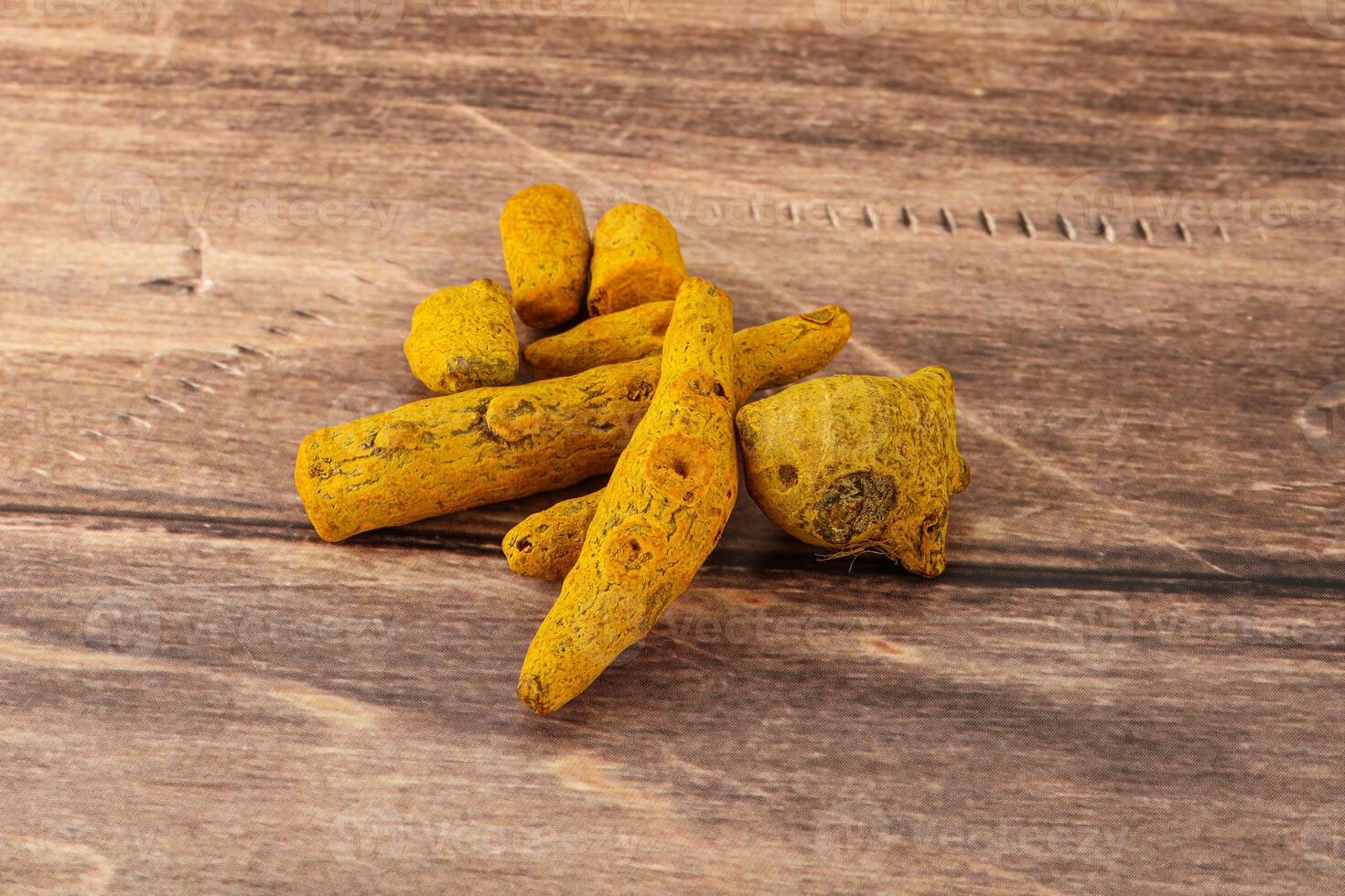 Indian spices - Turmeric root Curcuma photo
