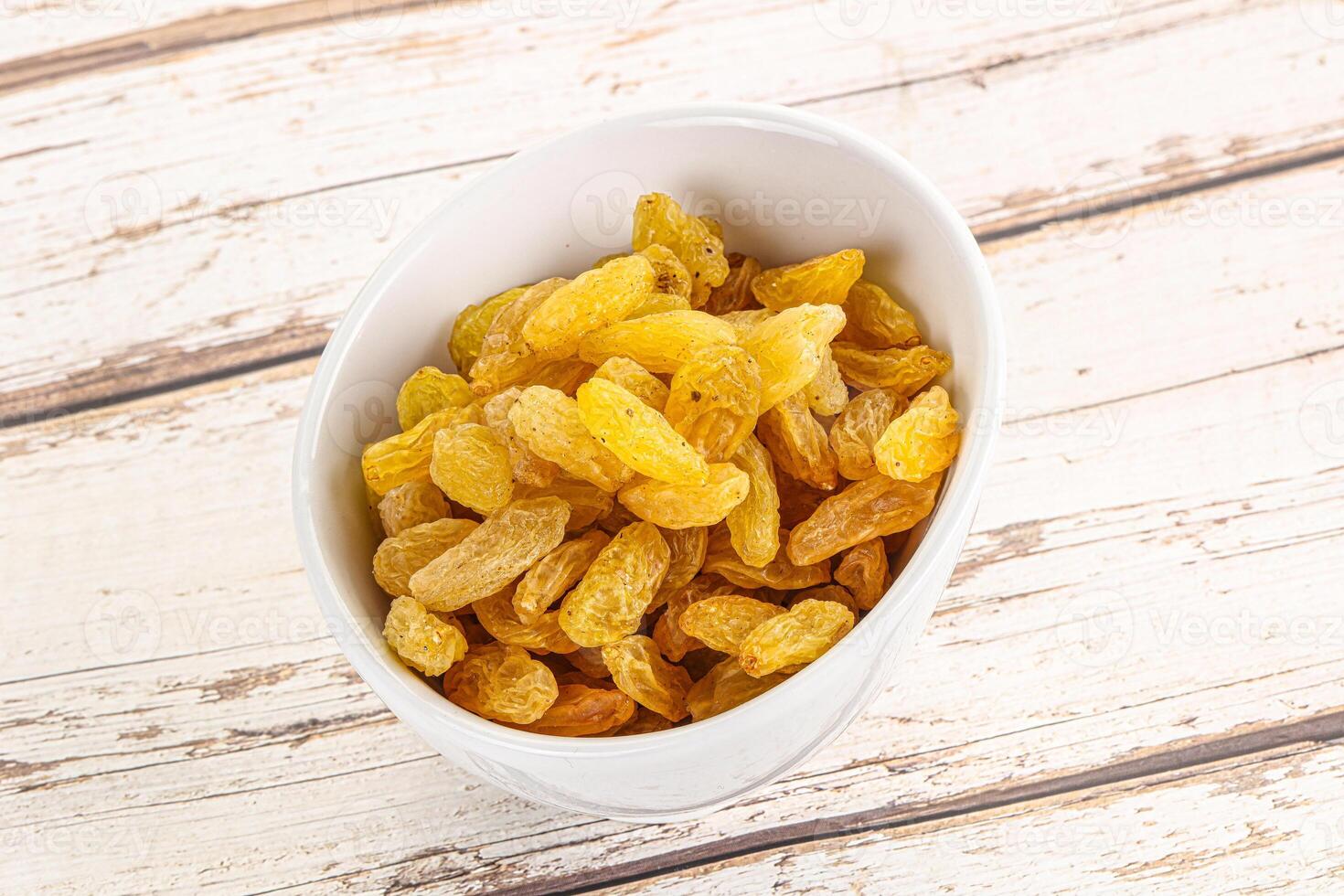 Yellow raisin - dry grape berries photo
