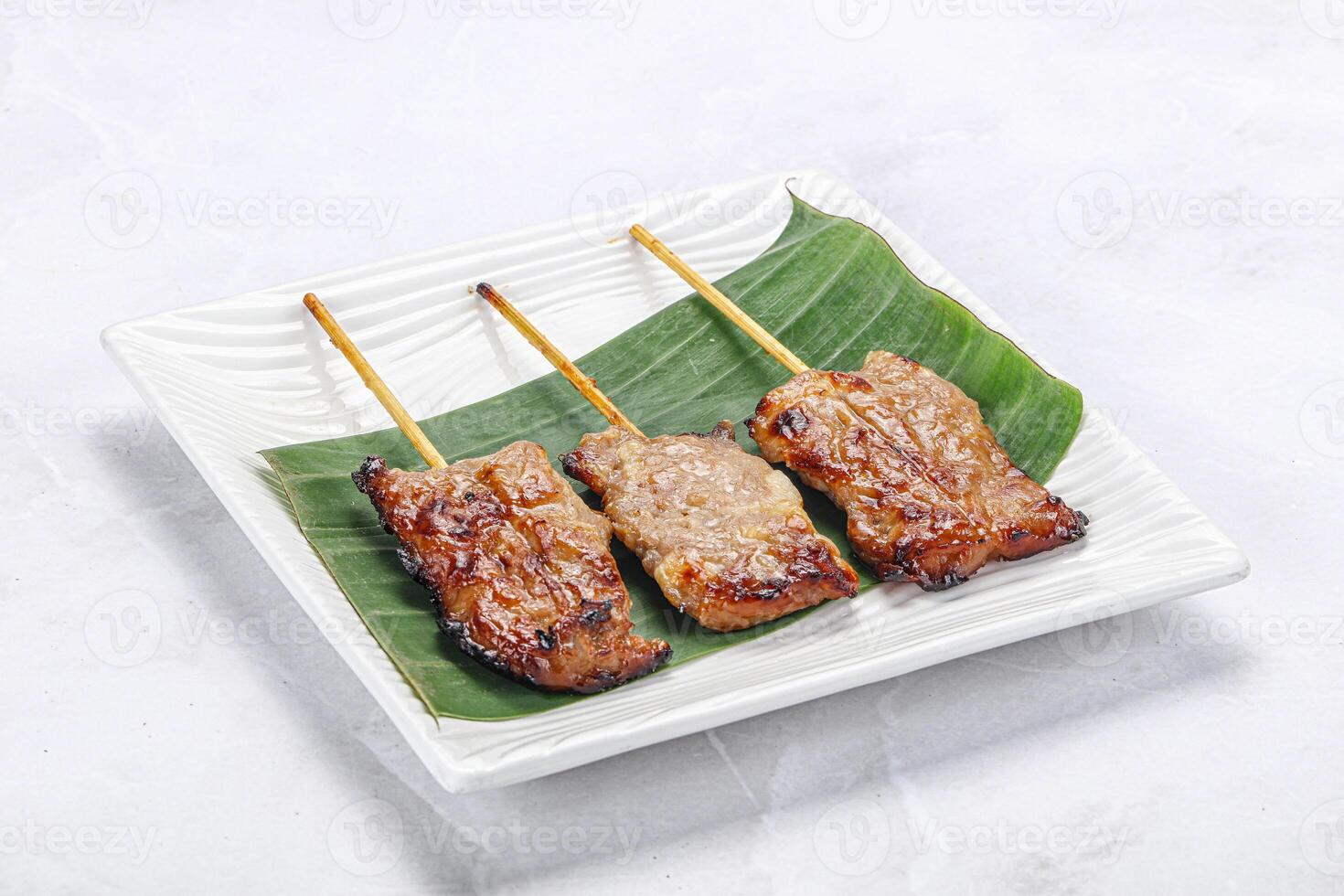 Thai cuisine - grilled pork skewer photo