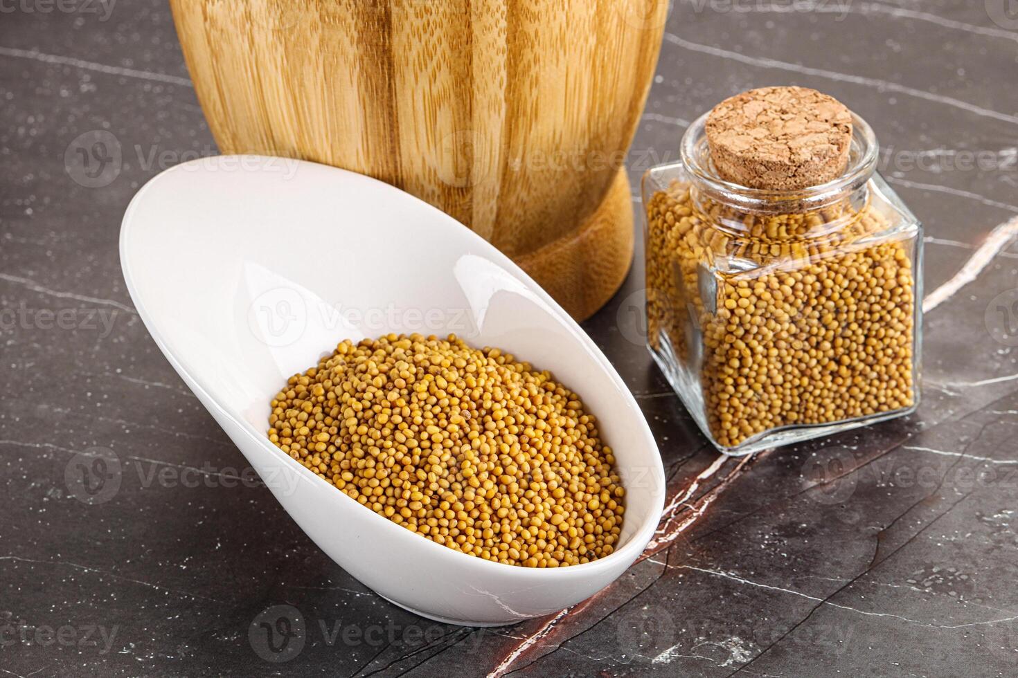 Mustard dry seeds in the bowl photo