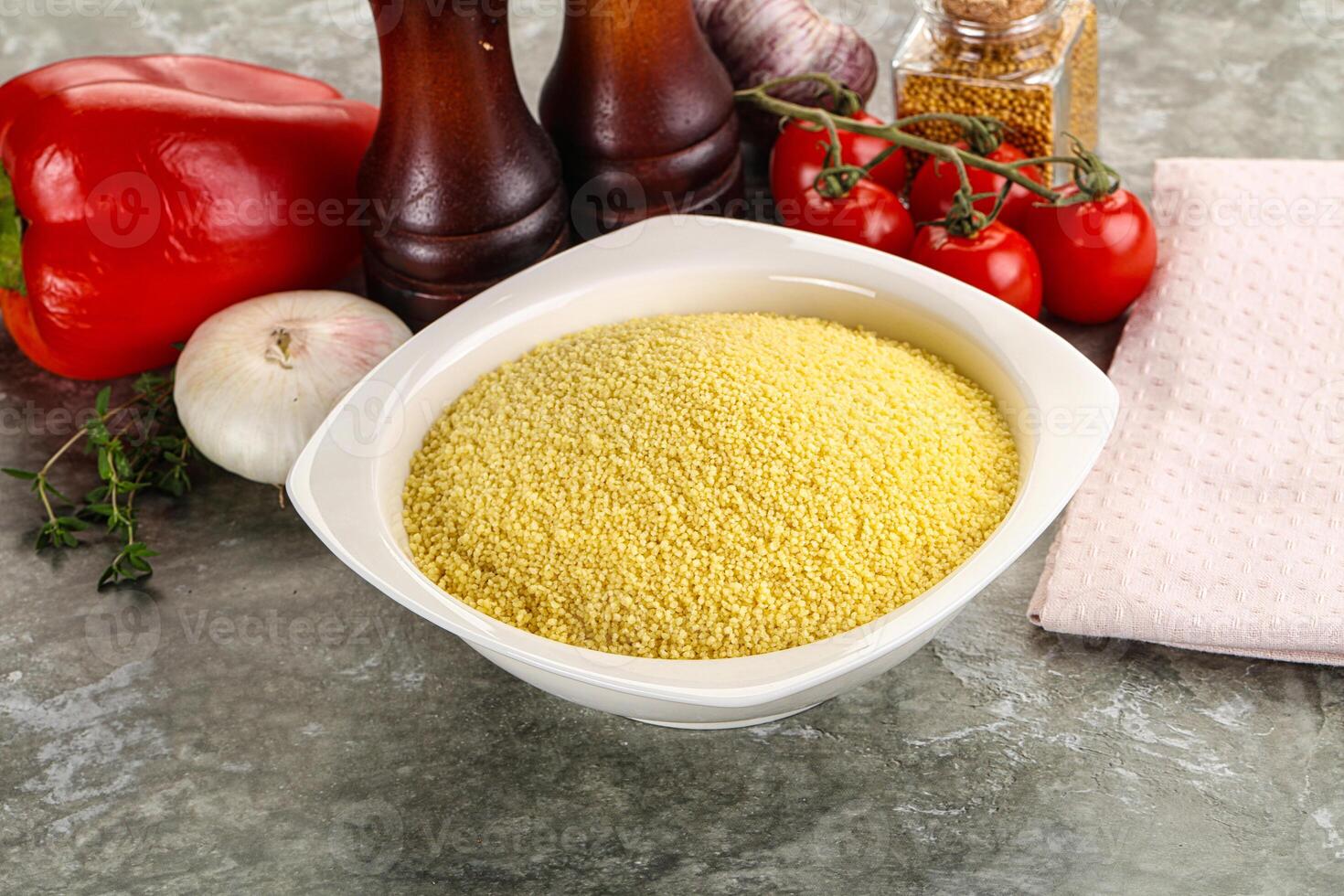 Raw dry wheat couscous grain photo