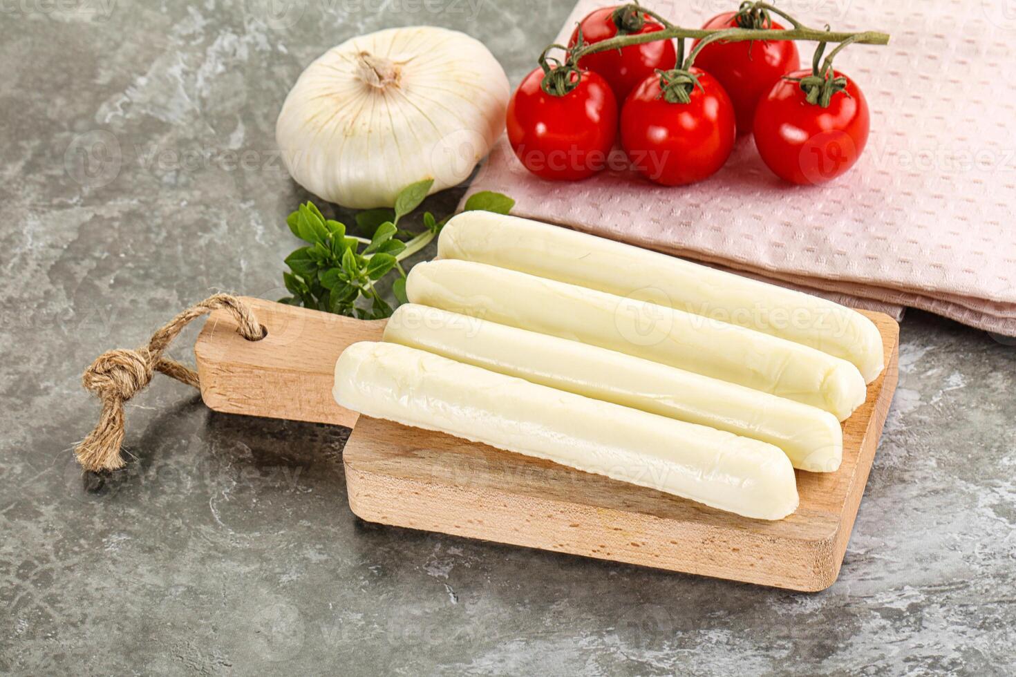 Mozzarella cheese stick heap snack photo