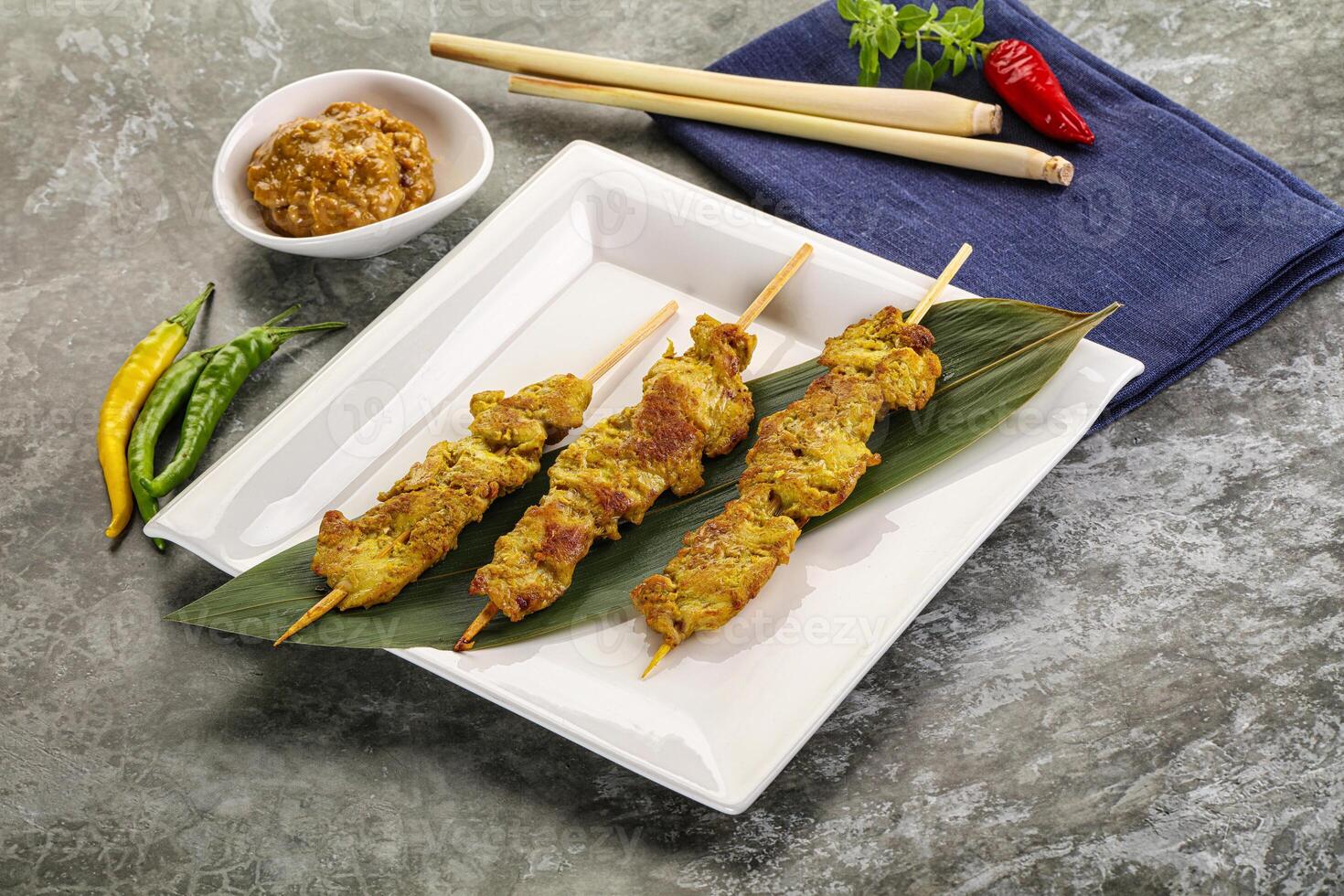 Thai meat skewer Satay with sauce photo