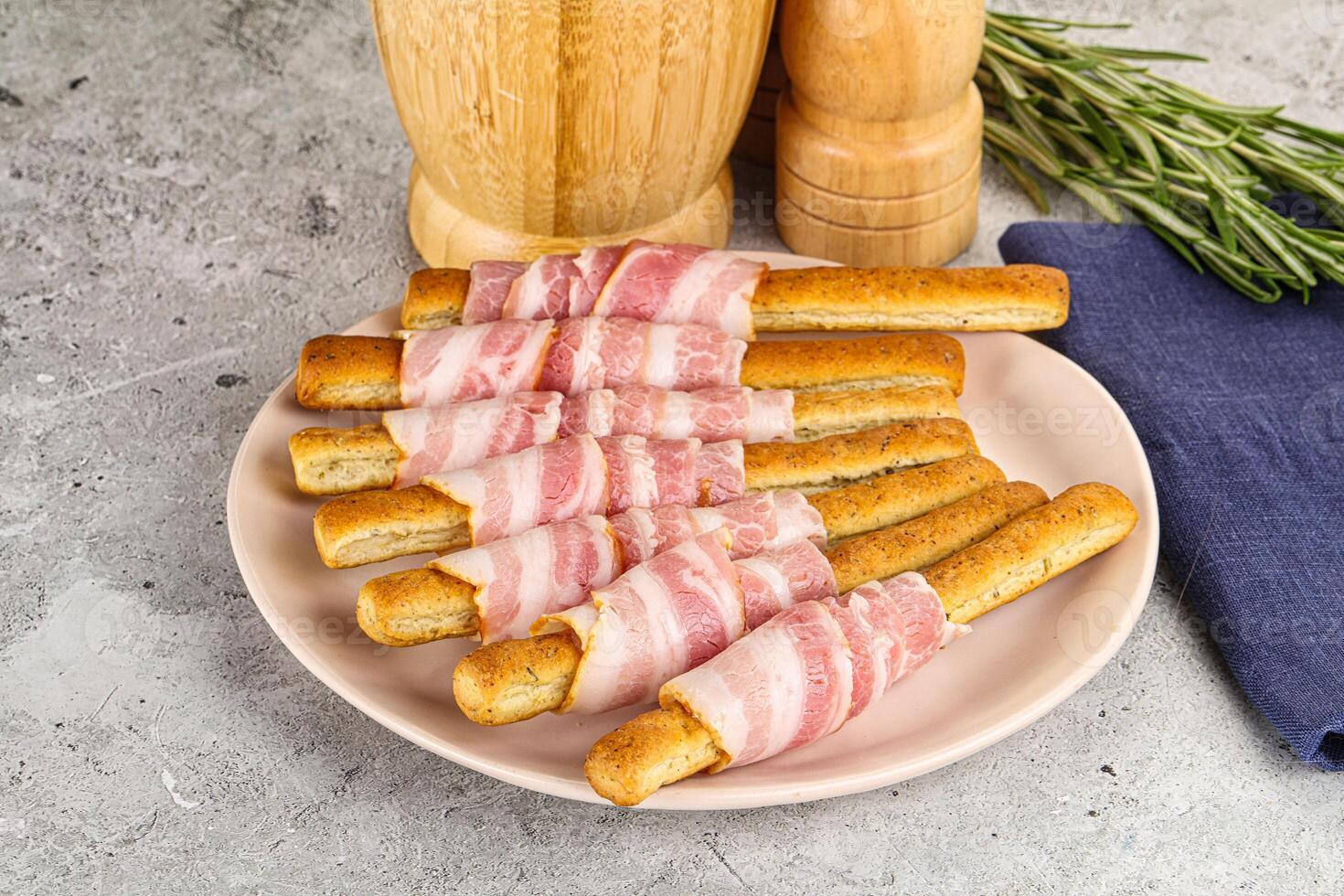 Crispy grissini italian bread with bacon photo