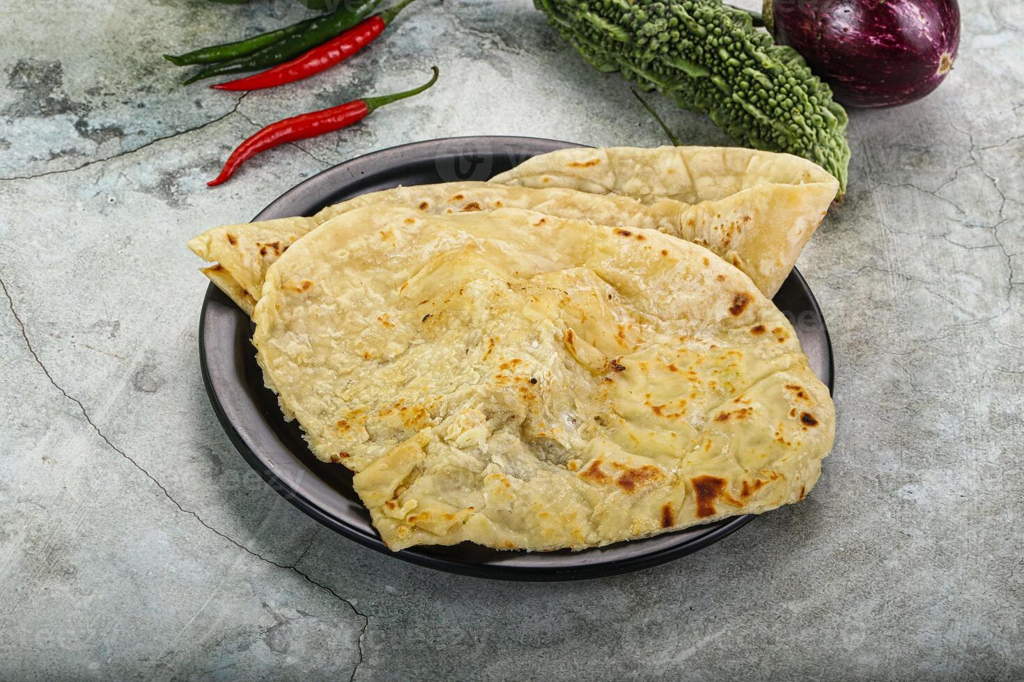 Indian tandori bread - naan with cheese photo
