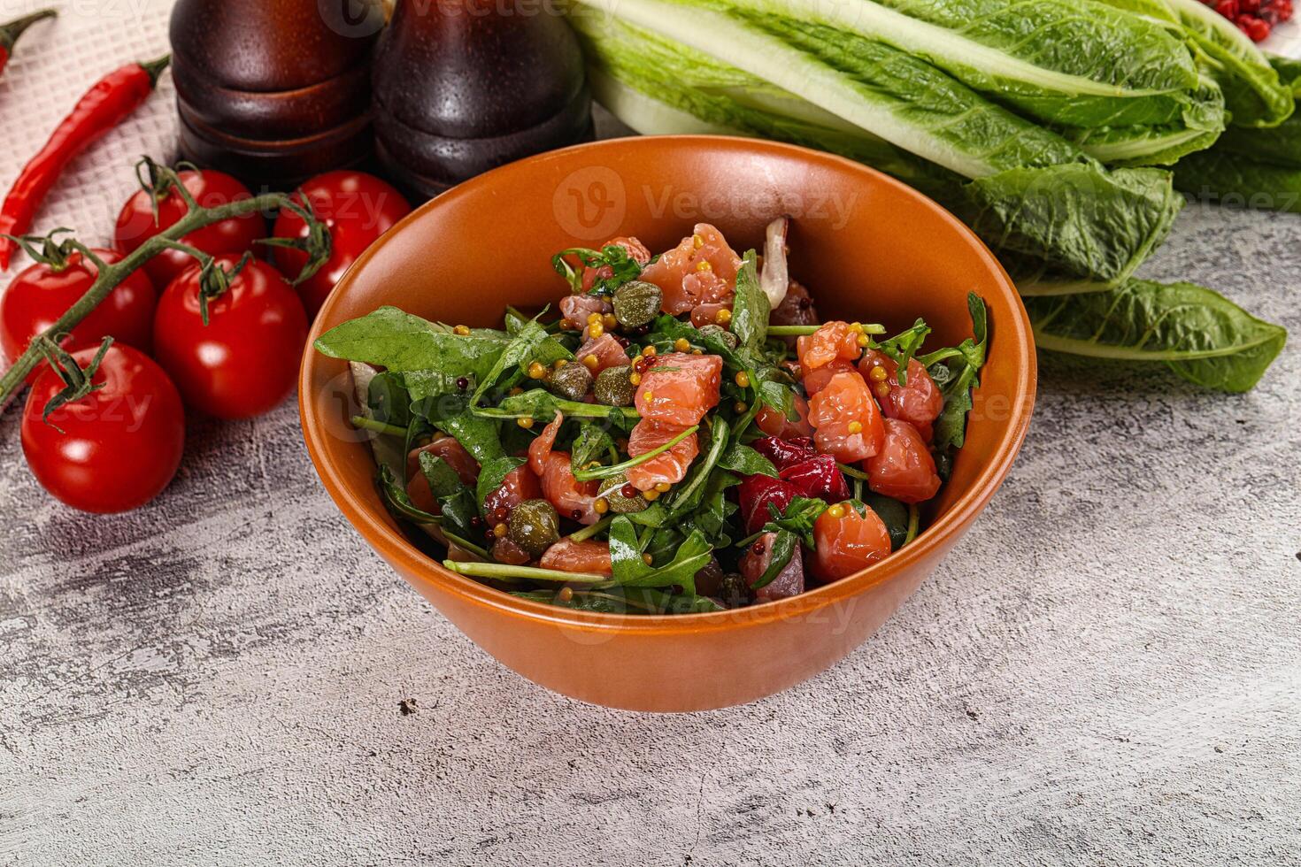 Salad with salmon and arugula photo