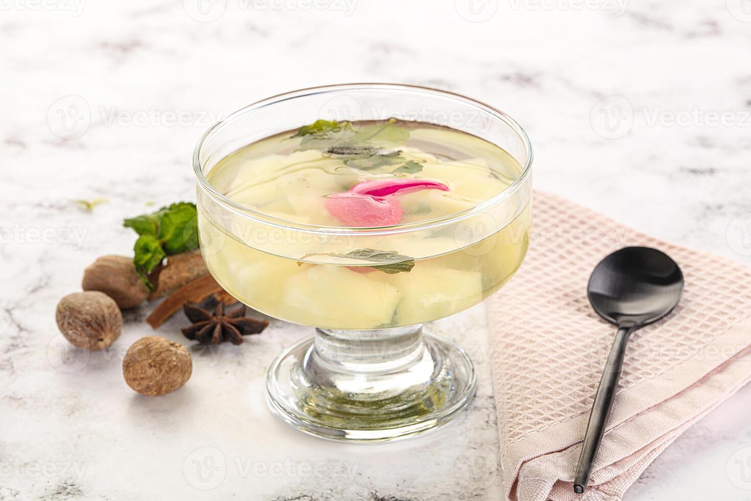 Sweet pineapple jelly with mint photo
