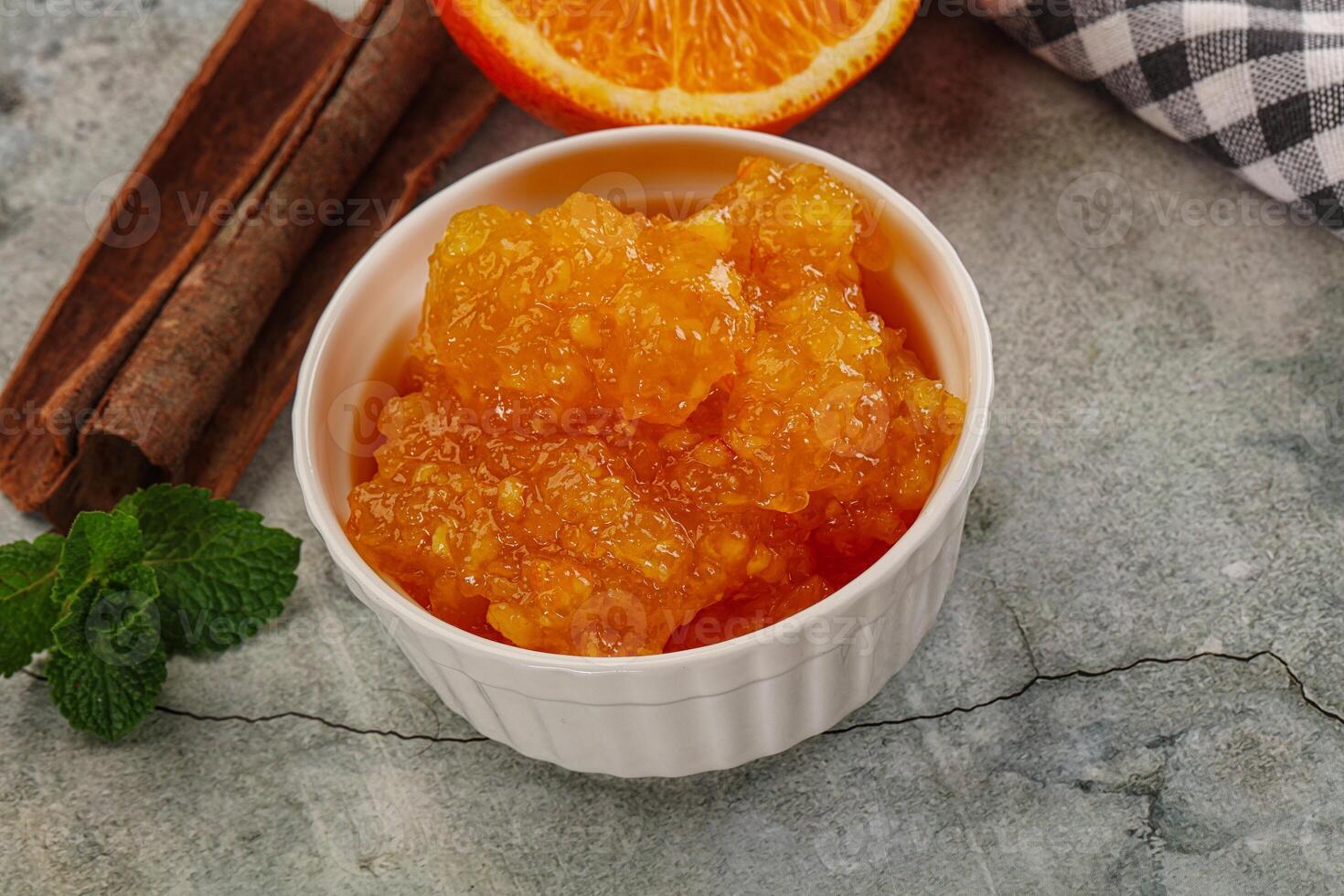 Tasty homemade Orange jam in the bowl photo