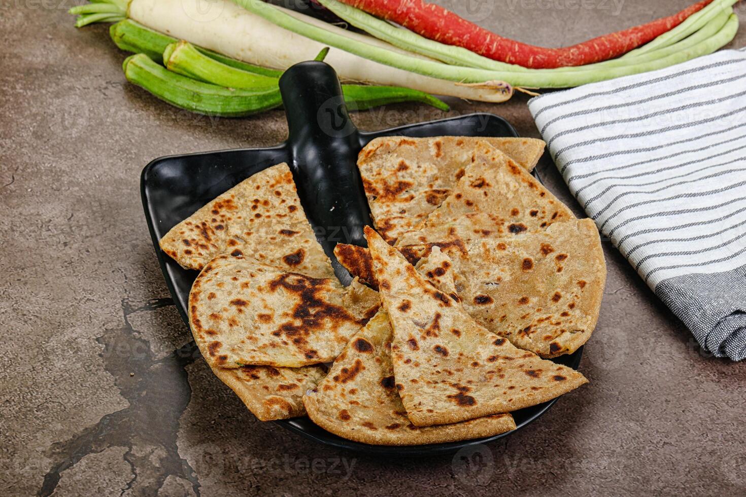 Indian Aloo Paratha - bread with potato photo