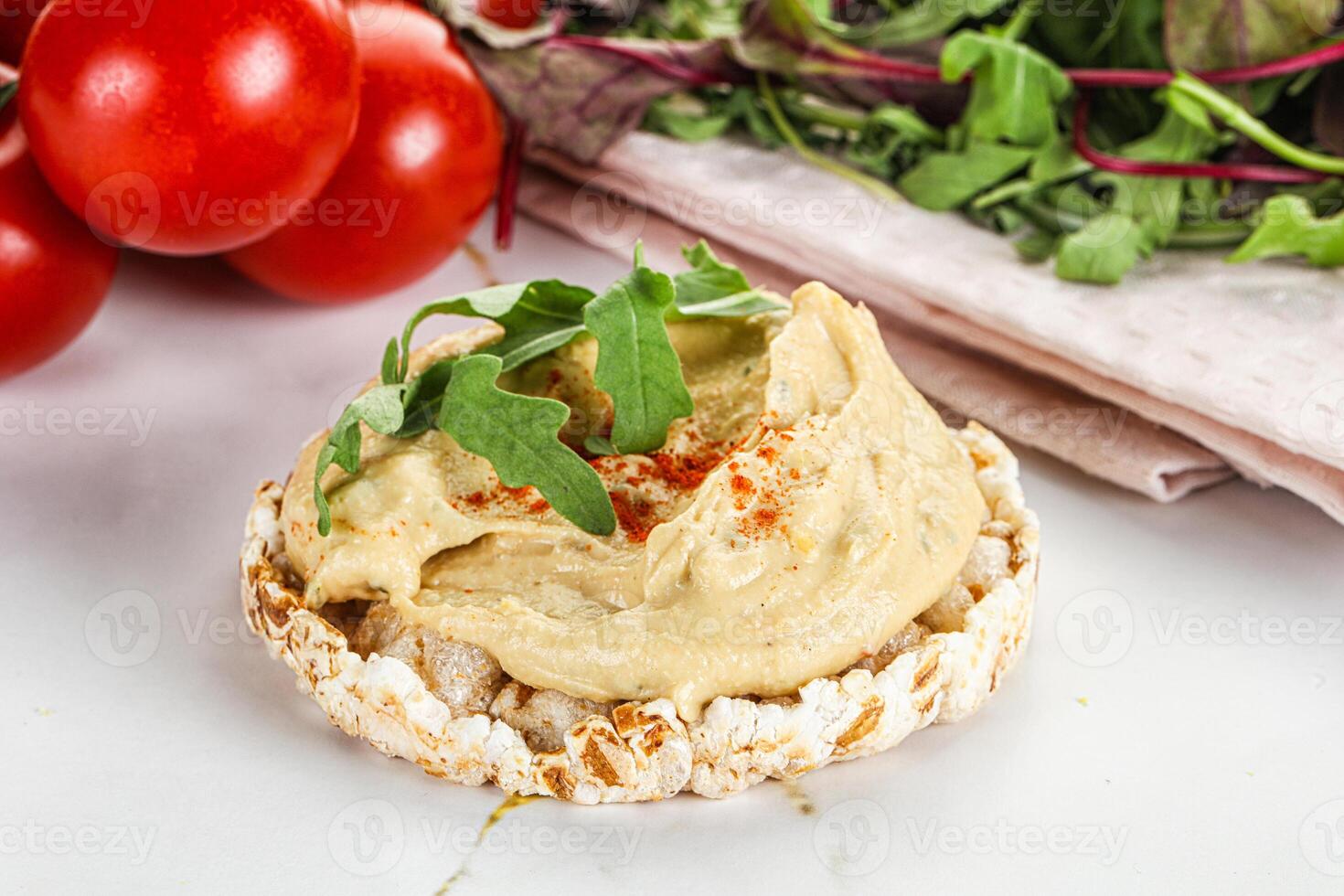 Crispbread with arabic creamy hummus photo