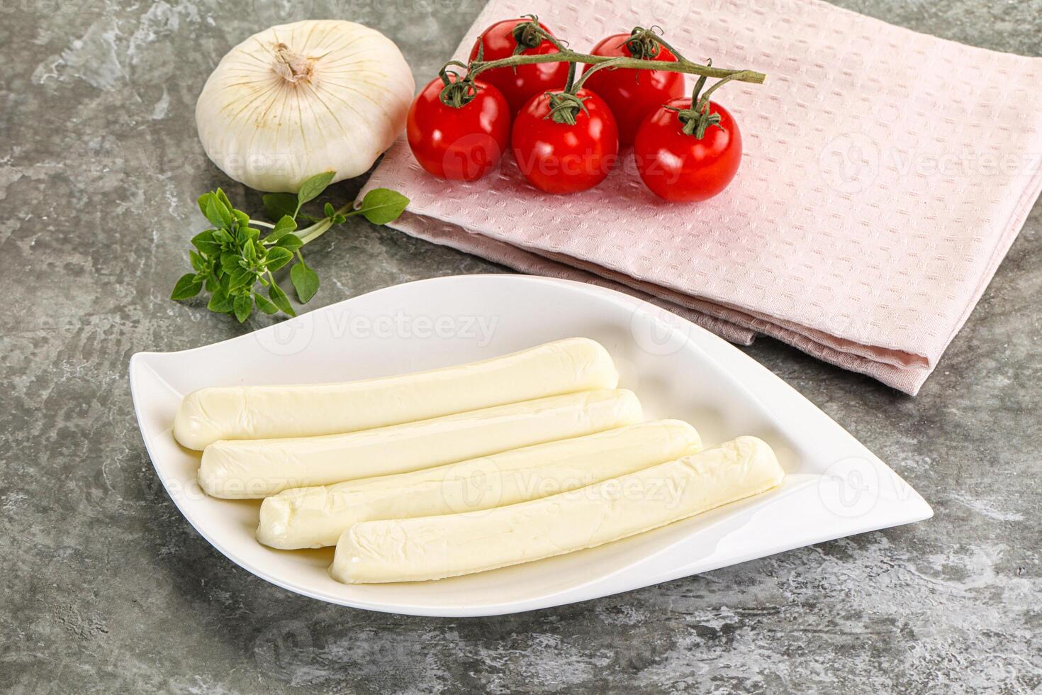 Mozzarella cheese stick heap snack photo
