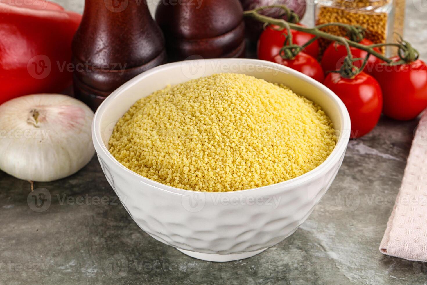 Raw dry wheat couscous grain photo