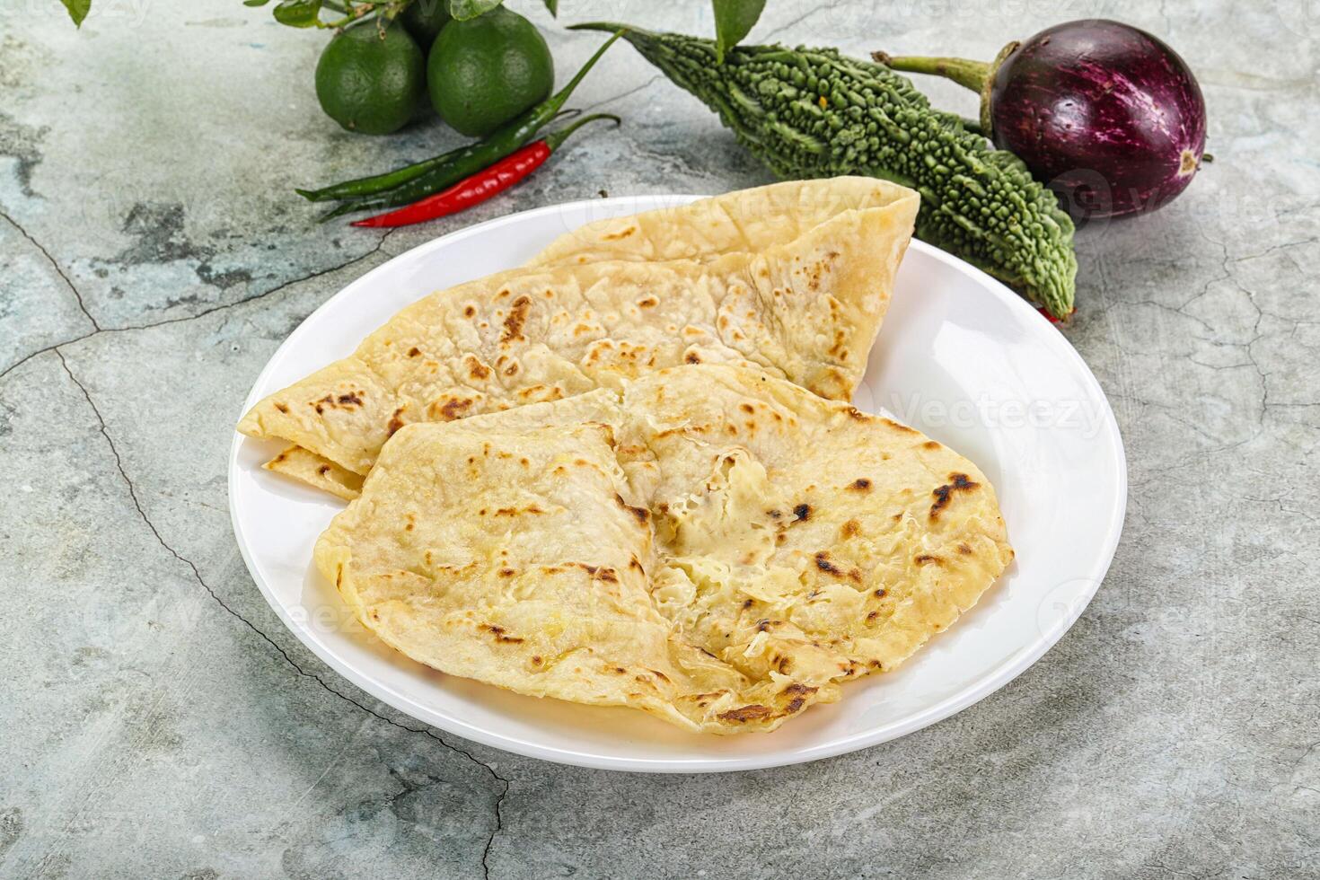 Indian tandori bread - naan with cheese photo